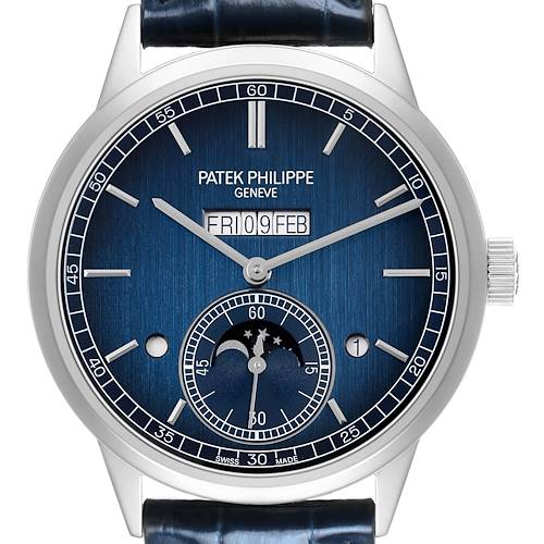 The image shows a front view of the Patek Philippe Complications 5236 Men's Platinum Blue Dial watch, featuring its dial, hands, and moon phase display.