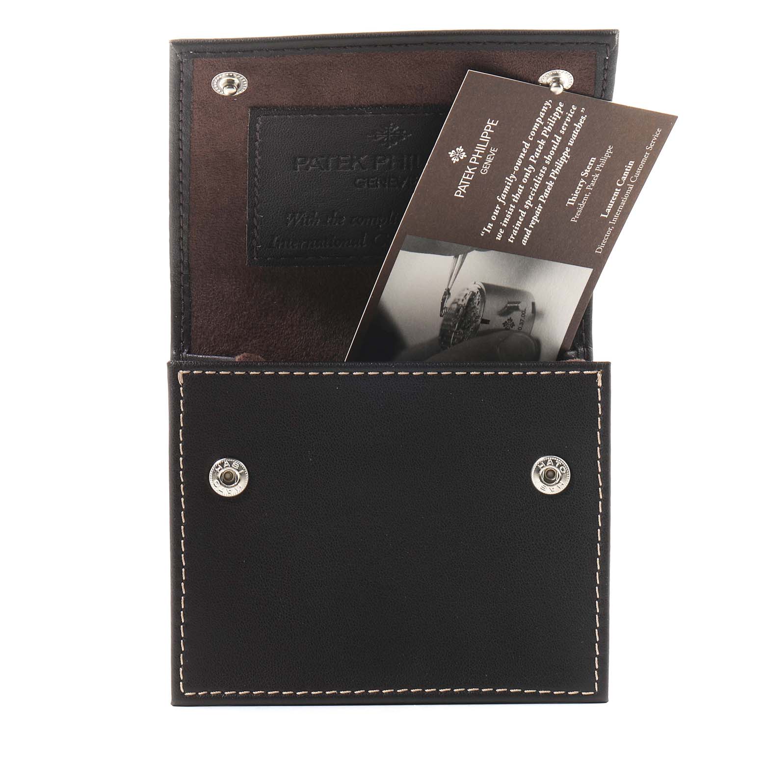 This image shows the protective case and documentation for the Patek Philippe Twenty-4 4910/10A-010 Women's Stainless Steel Grey Dial 4910/10A-010 Women's Stainless Steel Grey Dial model watch.