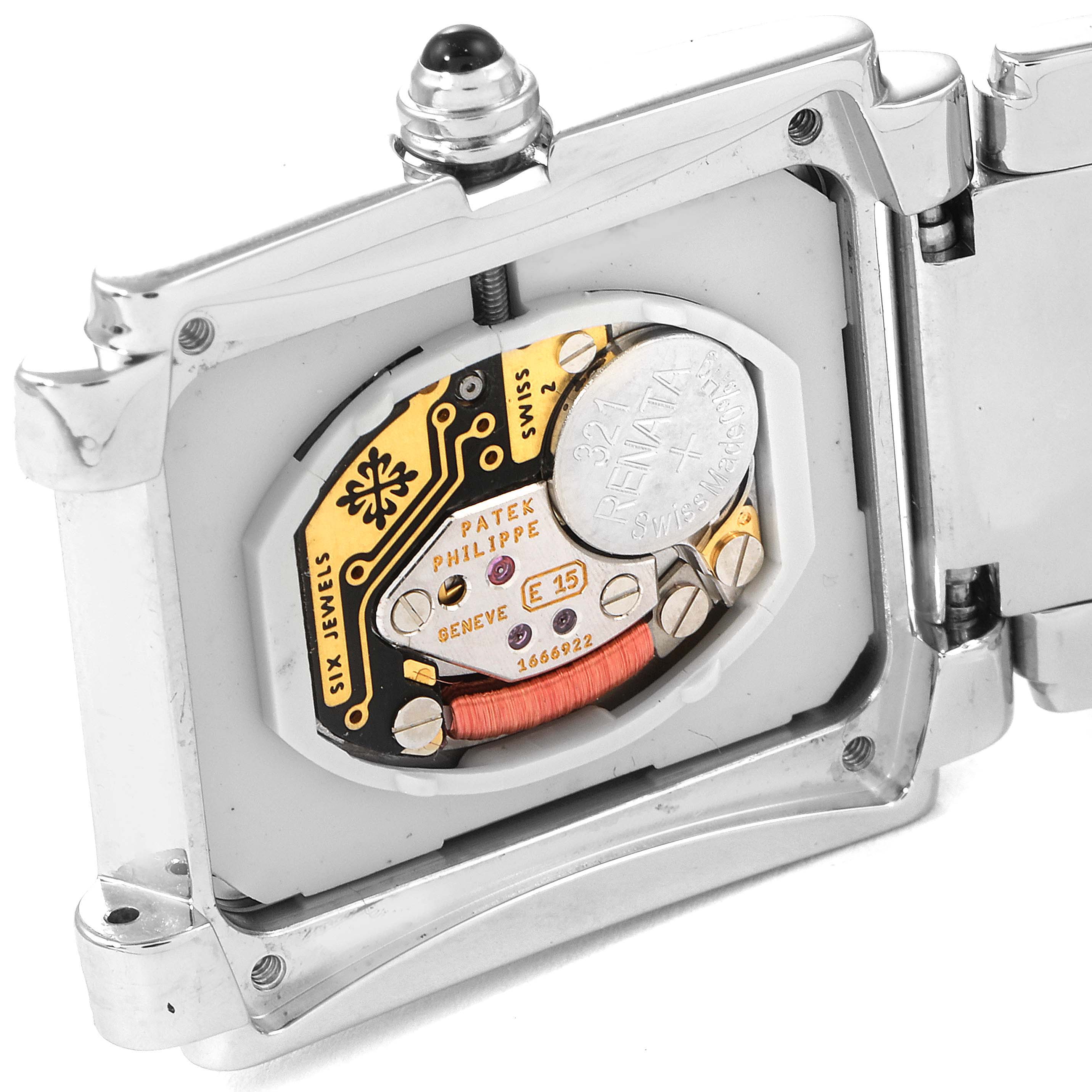 This image shows the inner mechanism and battery compartment of the Patek Philippe Twenty-4 4910/10A-010 Women's Stainless Steel Grey Dial 4910/10A-010 Women's Stainless Steel Grey Dial watch from a back angle.