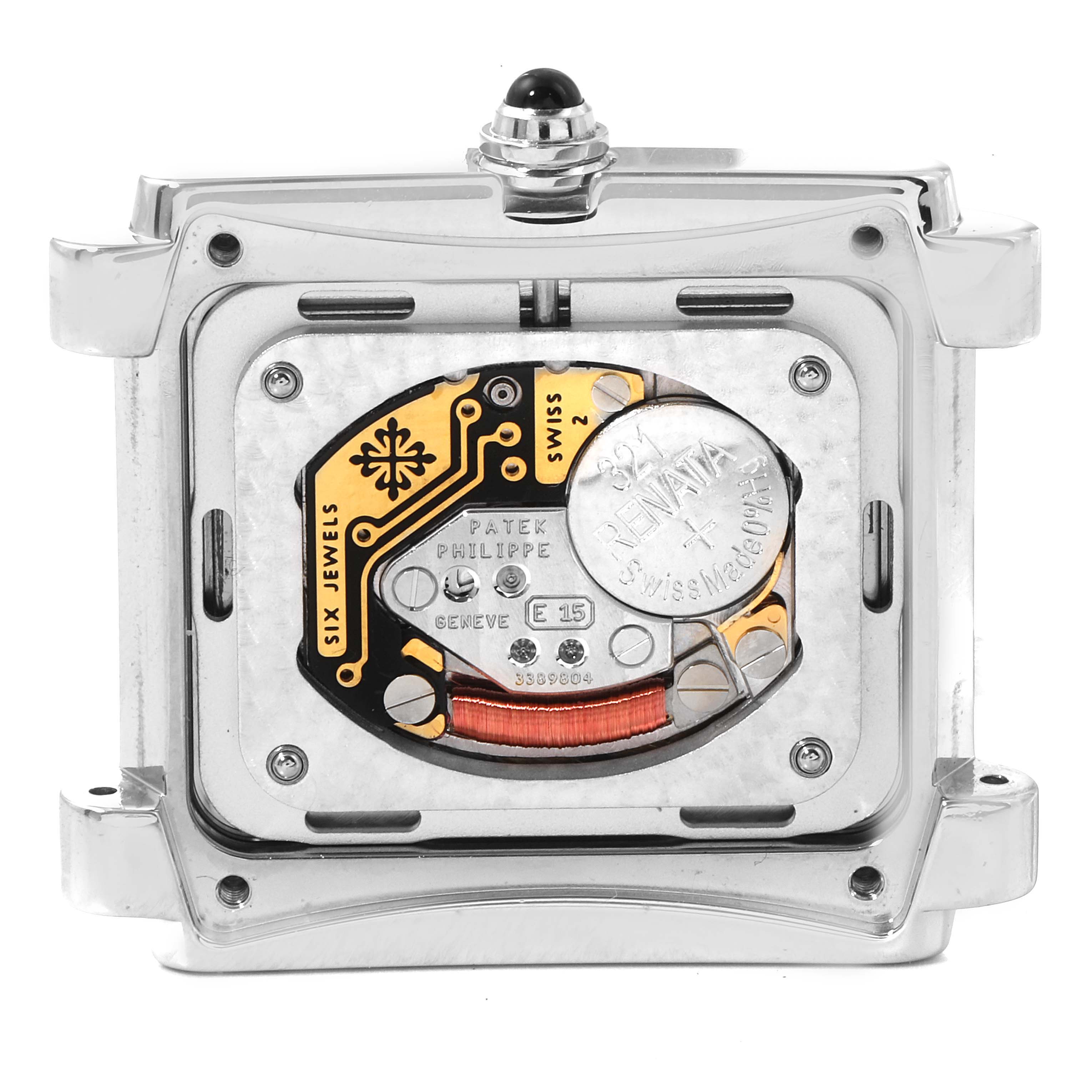 This image shows the back view of the Patek Philippe Twenty-4 4910/10A-010 Women's Stainless Steel Grey Dial 4910/10A-010 Women's Stainless Steel Grey Dial watch, revealing its internal mechanism and battery.