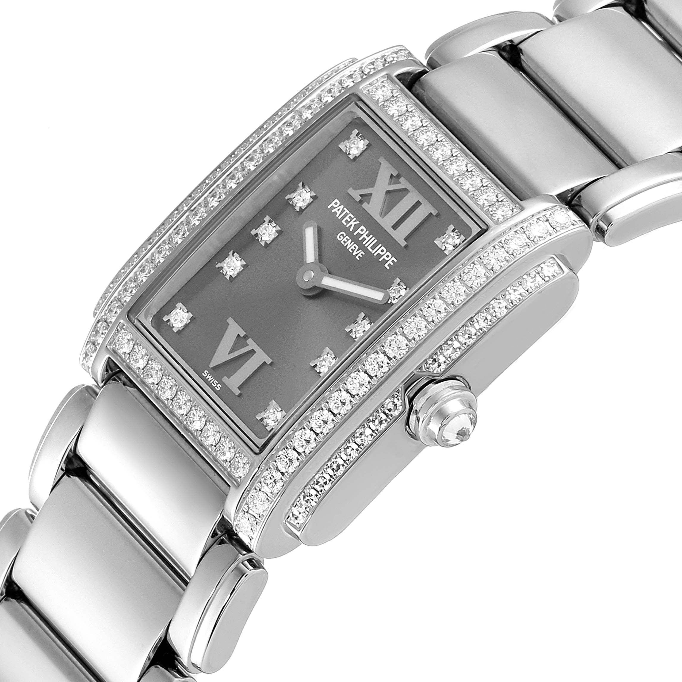 The image shows a close-up angled view of a Patek Philippe Twenty-4 4908/200G-001 Women's White Gold Grey Dial 4908/200G-001 Women's White Gold Grey Dial watch, highlighting the face, bezel, and bracelet.