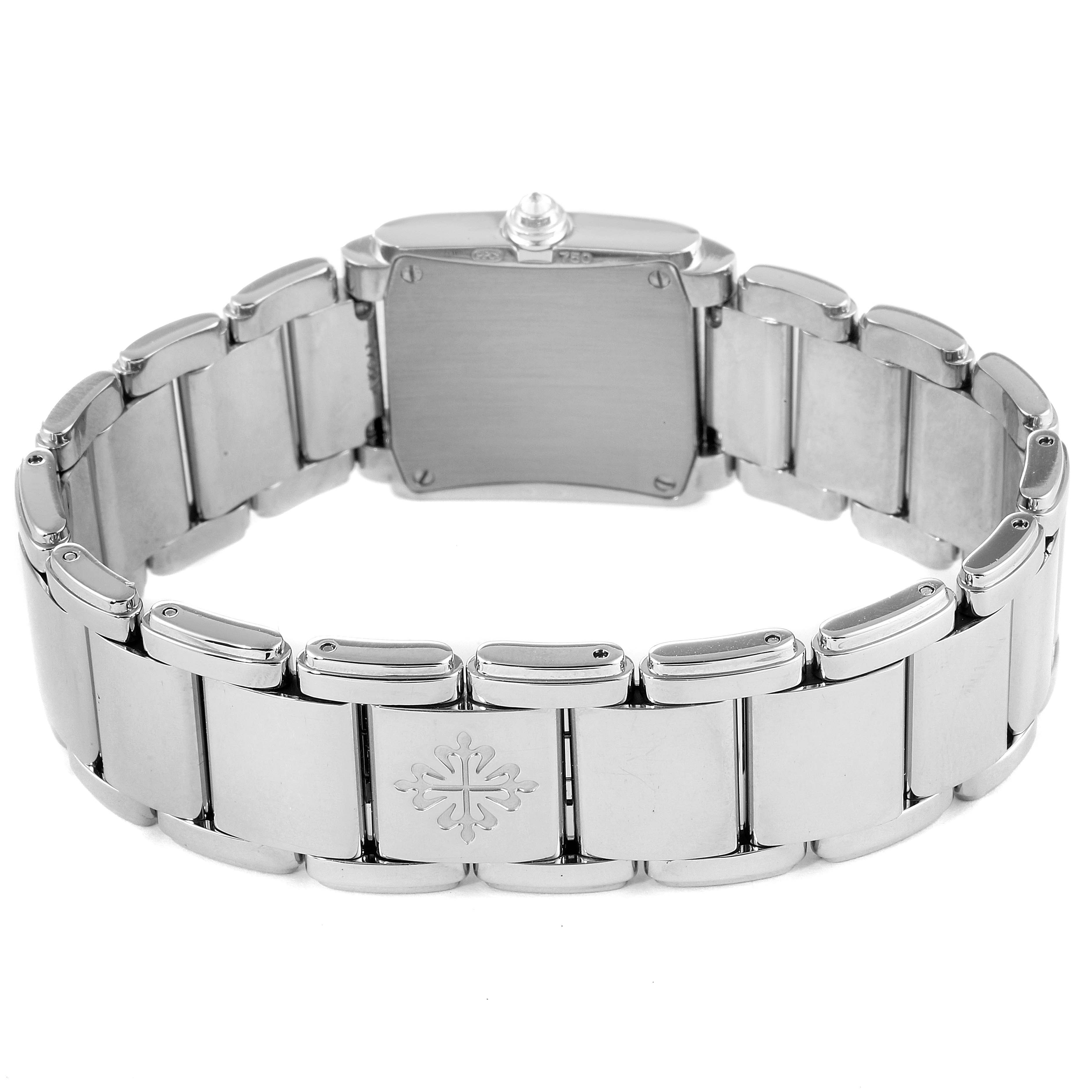 This image features the back view of a Patek Philippe Twenty-4 4908/200G-001 Women's White Gold Grey Dial 4908/200G-001 Women's White Gold Grey Dial watch, showcasing its metal bracelet and clasp.