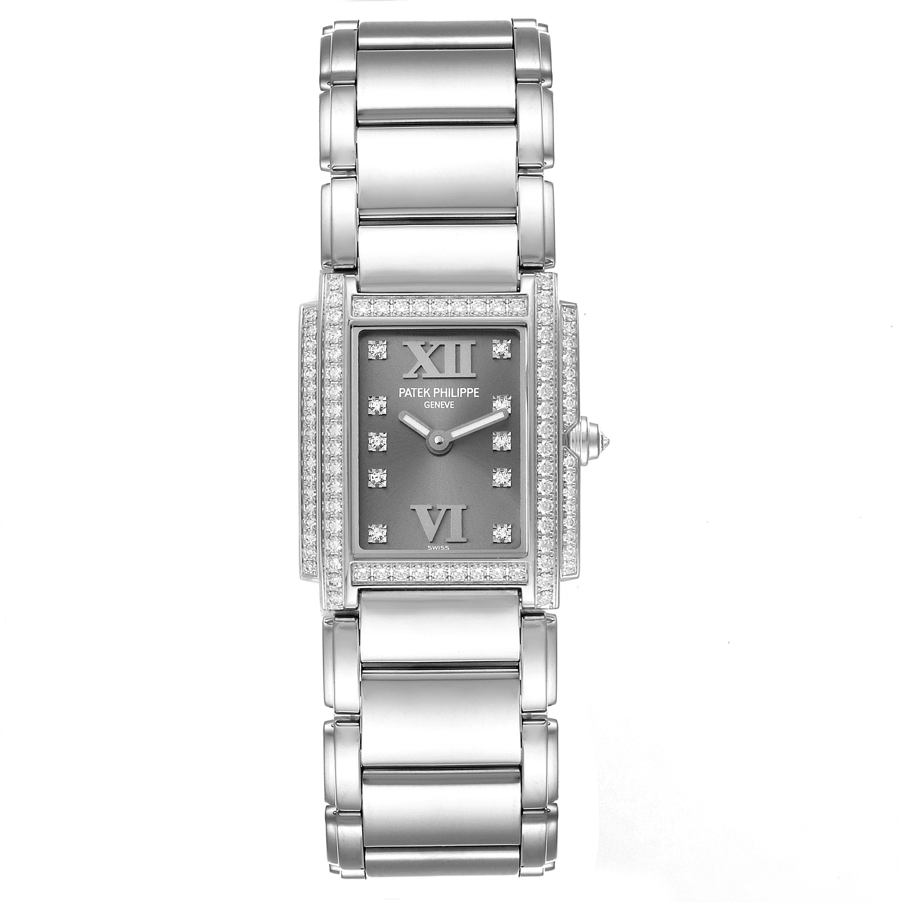 The image shows a top view of the Patek Philippe Twenty-4 4908/200G-001 Women's White Gold Grey Dial 4908/200G-001 Women's White Gold Grey Dial watch, highlighting its rectangular face, bracelet, and diamond accents.