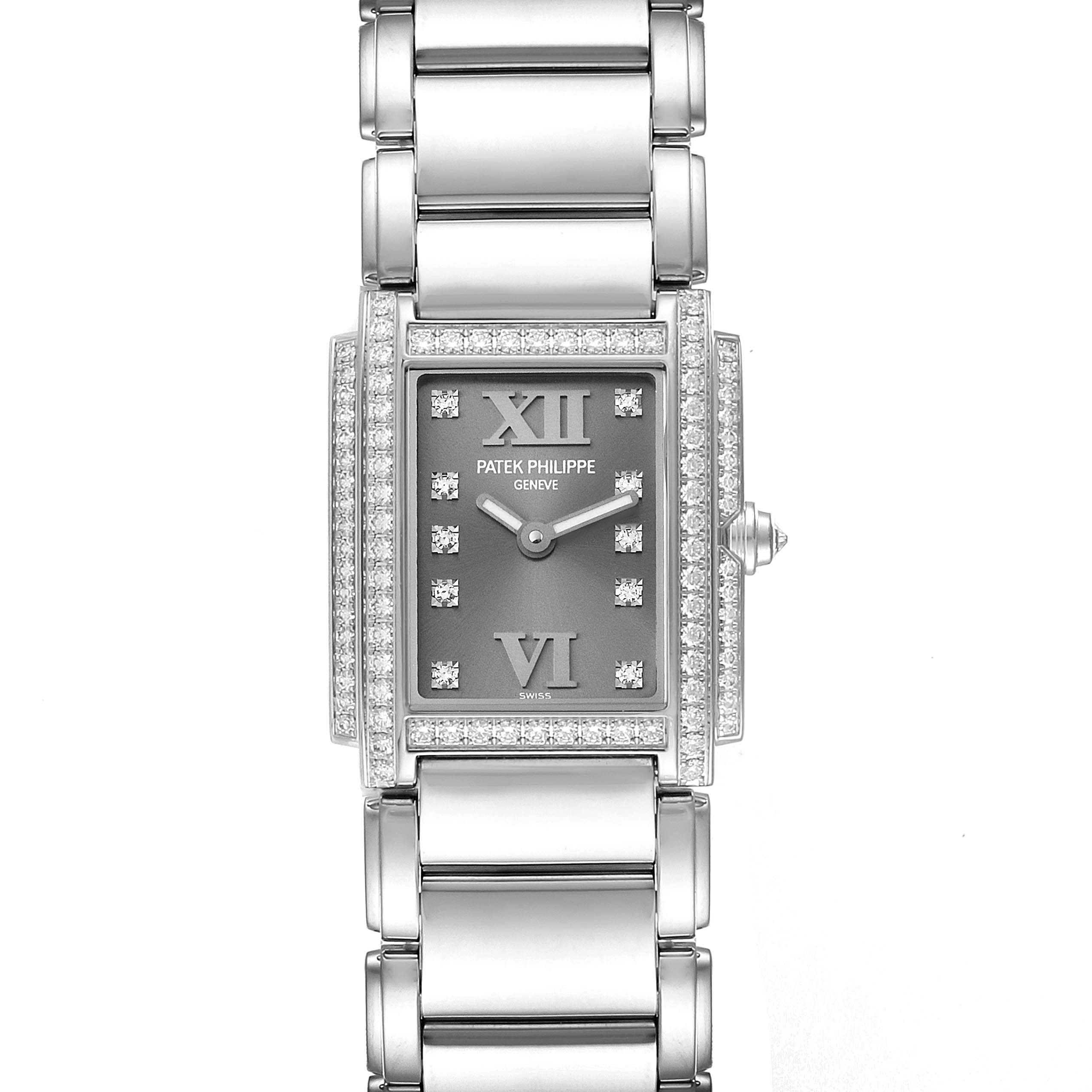 This image shows a Patek Philippe Twenty-4 4908/200G-001 Women's White Gold Grey Dial 4908/200G-001 Women's White Gold Grey Dial watch from a top view, highlighting the face, bracelet, and diamond accents.