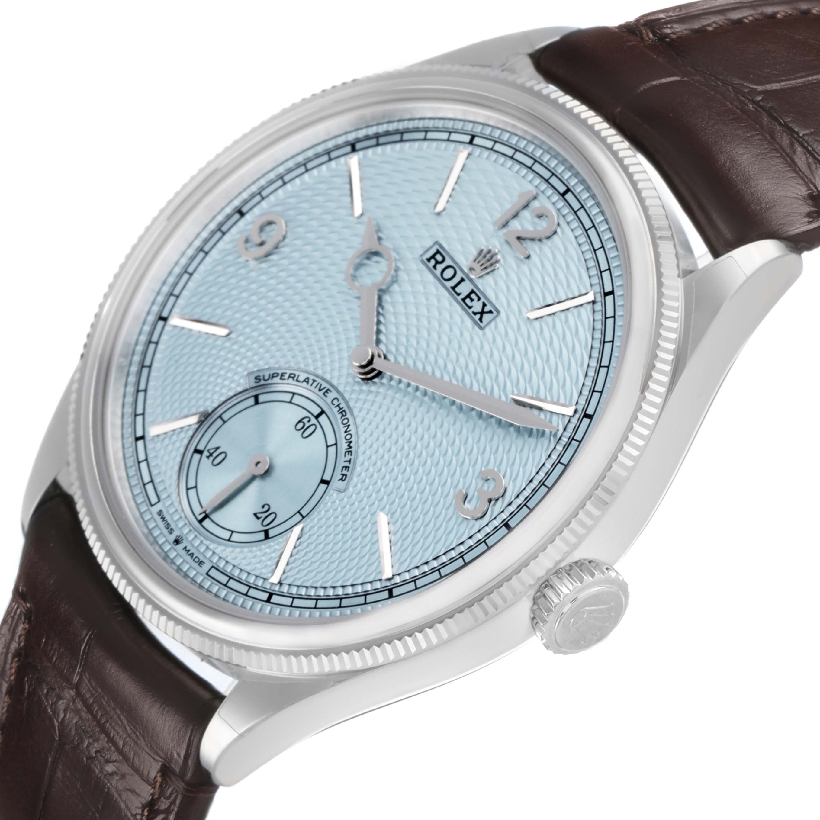 The Rolex 1908 52506 Men's Platinum Blue Dial model is shown at an angle displaying the face, crown, and part of the brown leather strap.