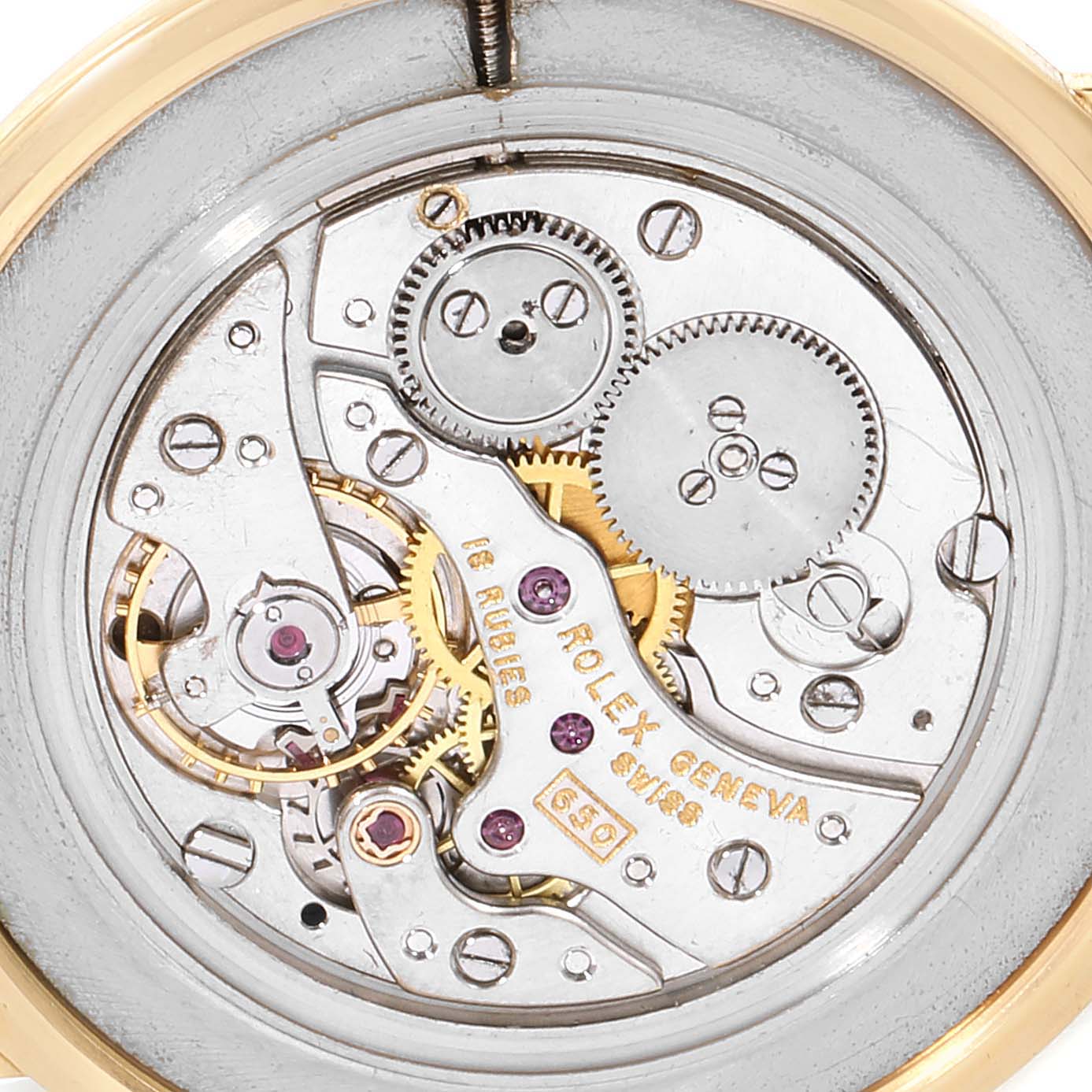 The image shows the intricate back movement and inner gears of a Rolex Cellini 9576 Men's Yellow Gold Silver Dial 9576 Men's Yellow Gold Silver Dial watch.