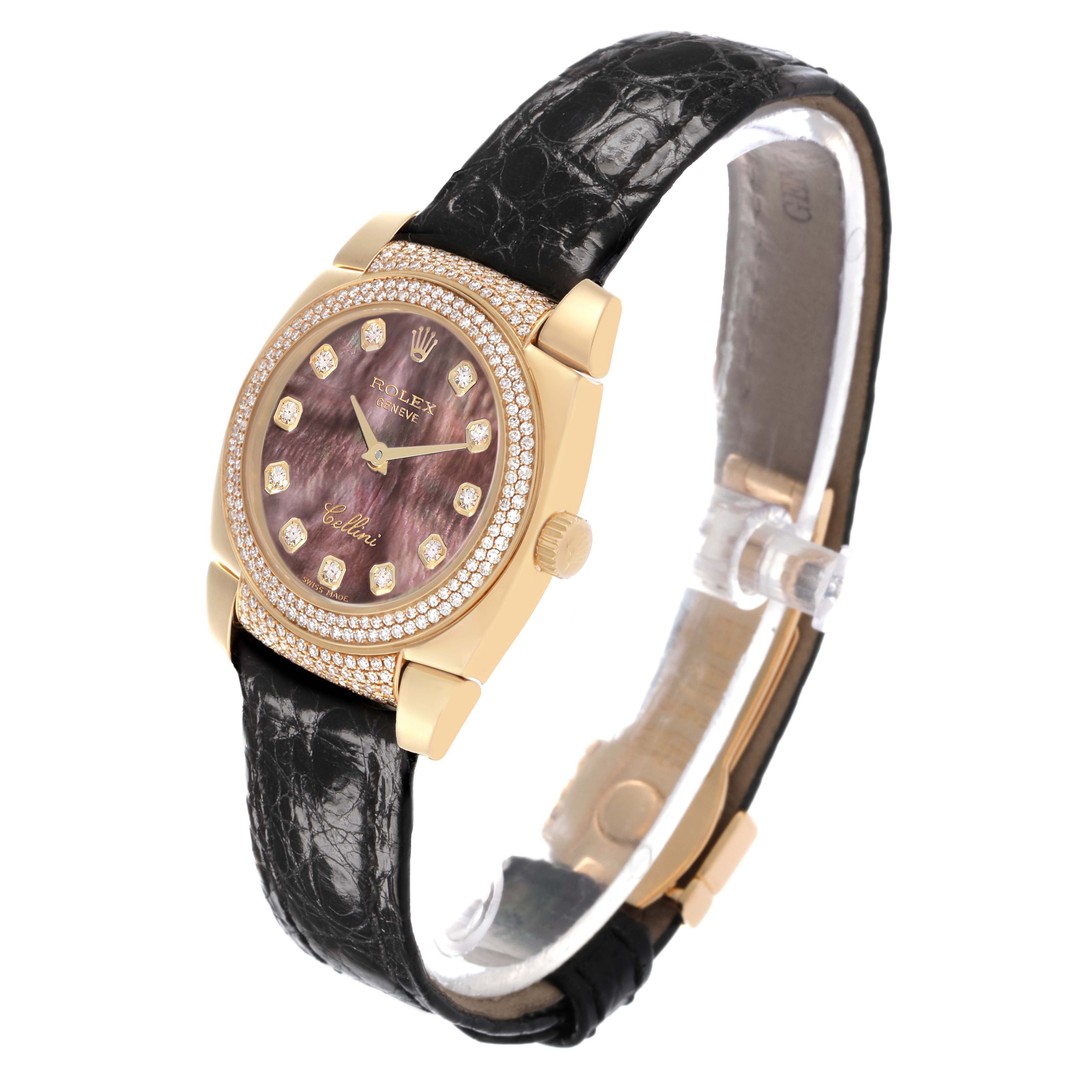 The Rolex Cellini 6311 Women's Yellow Gold Mother of Pearl Dial watch is shown at a slight angle, displaying its face, crown, and leather strap.