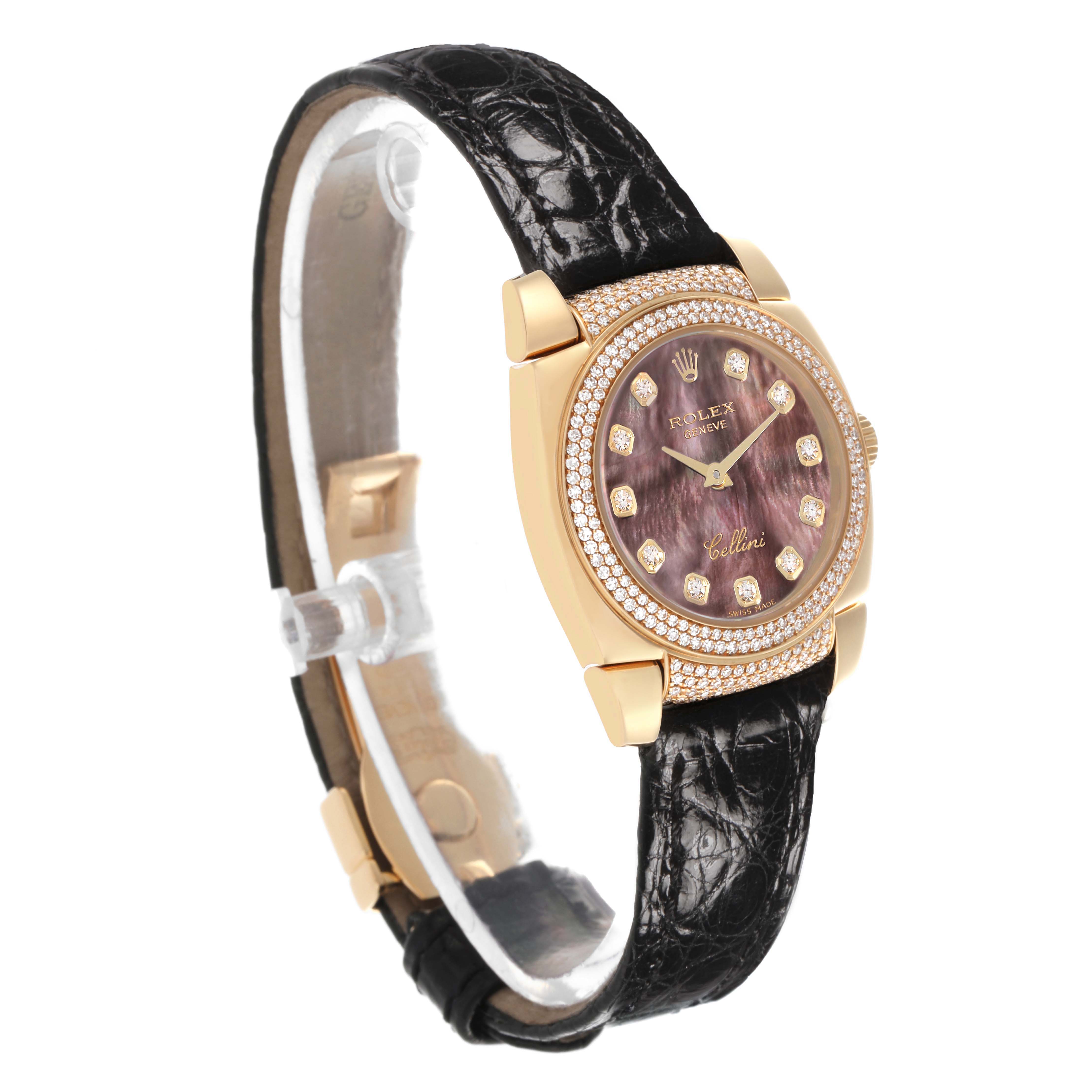 The Rolex Cellini 6311 Women's Yellow Gold Mother of Pearl Dial watch is shown at a three-quarter angle, highlighting its face, bejeweled bezel, crown, and black leather strap.