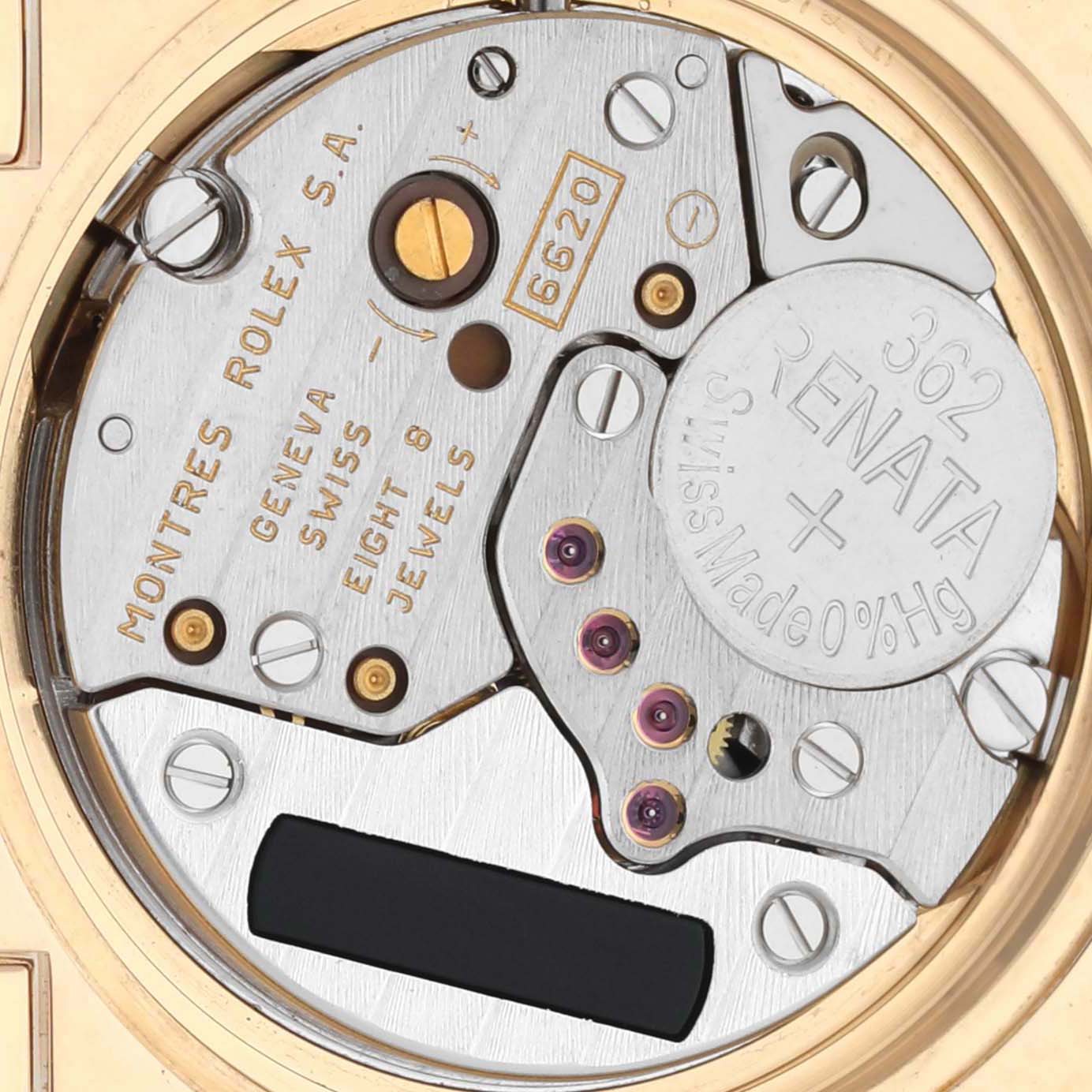 The image shows a close-up of the movement of a Rolex Cellini 6311 Women's Yellow Gold Mother of Pearl Dial watch, highlighting components and engravings.