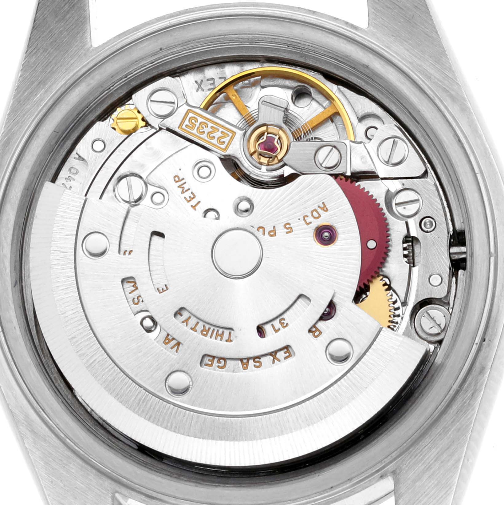 The image shows the movement of a Rolex Date 79160 Women
s Stainless Steel Blue Dial 79160 Women
s Stainless Steel Blue Dial watch from a top view, revealing components like the rotor and gear train.