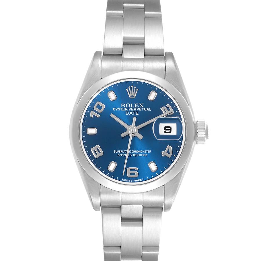 The Rolex Date watch is shown from a top-down angle, highlighting its blue dial, indices, bezel, and bracelet.