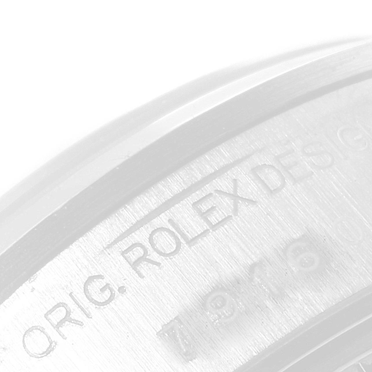 The image shows a macro view of the inner casing of a Rolex Date 79160 Women's Stainless Steel Black Dial 79160 Women's Stainless Steel Black Dial model watch with the inscription "ORIG. ROLEX DES."