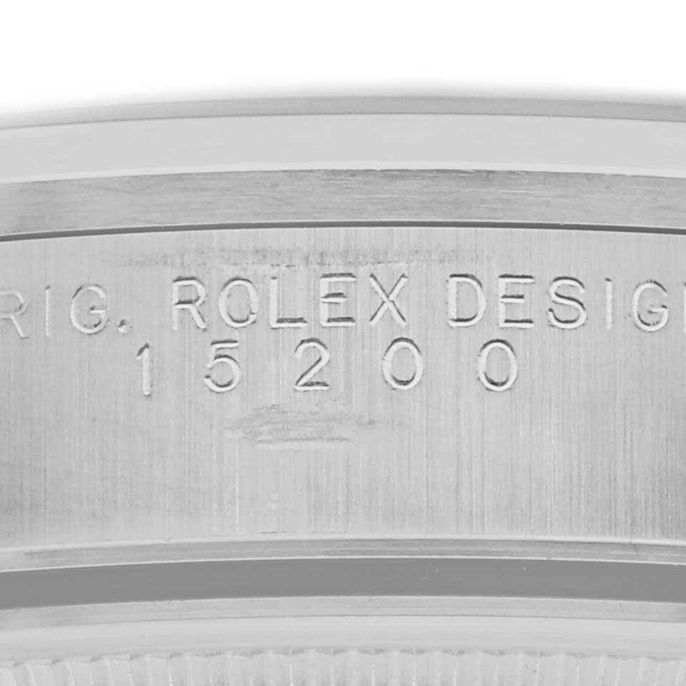 This image shows a close-up of the side of a Rolex Date 15200 Men's Stainless Steel Black Dial 15200 Men's Stainless Steel Black Dial watch case with model number 15200 engraved.