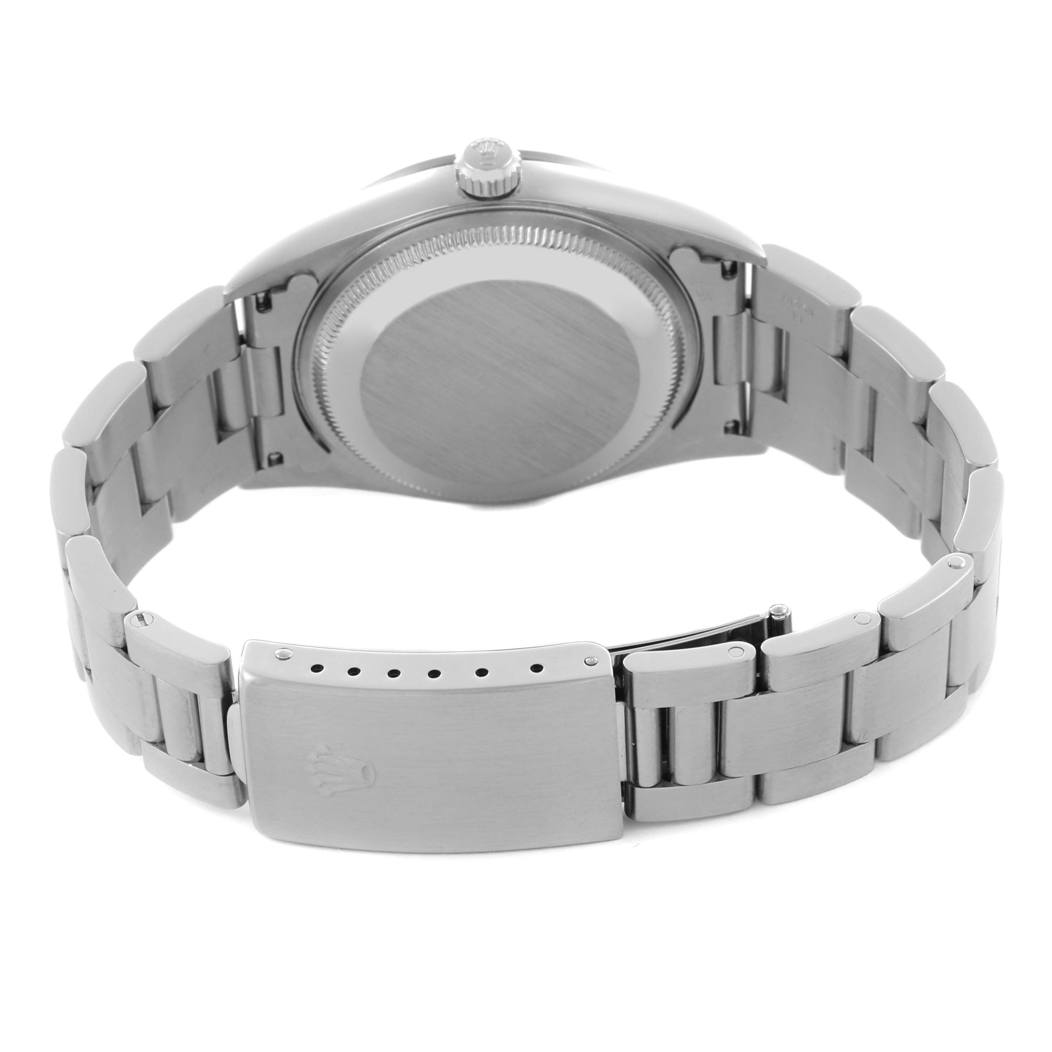 The image shows the back of the Rolex Date 15200 Men's Stainless Steel Pink Dial 15200 Men's Stainless Steel Pink Dial watch, focusing on the case back and the metal bracelet.