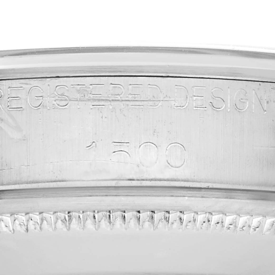 The image shows a close-up of the engraved model number "1500" on the interior casing of a Rolex Date 1500 Men's Stainless Steel Silver Dial 1500 Men's Stainless Steel Silver Dial watch.