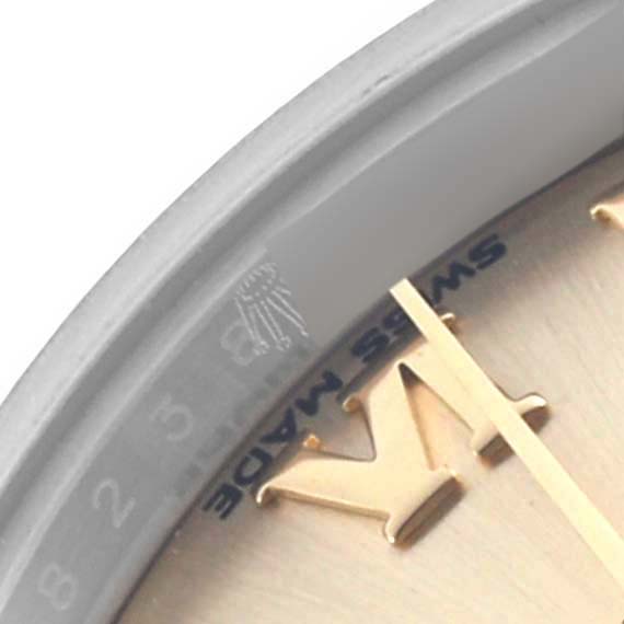 The image shows a close-up of the dial edge and part of the hands of a Rolex Datejust 279173 Women's Steel and Gold (two tone) Champagne Dial 279173 Women's Steel and Gold (two tone) Champagne Dial watch.