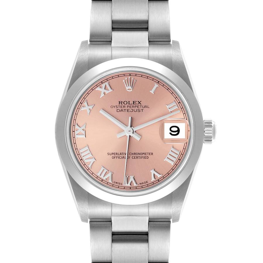 The Rolex Mid-Size watch is shown from a frontal angle, displaying the dial, bezel, bracelet, and crown.