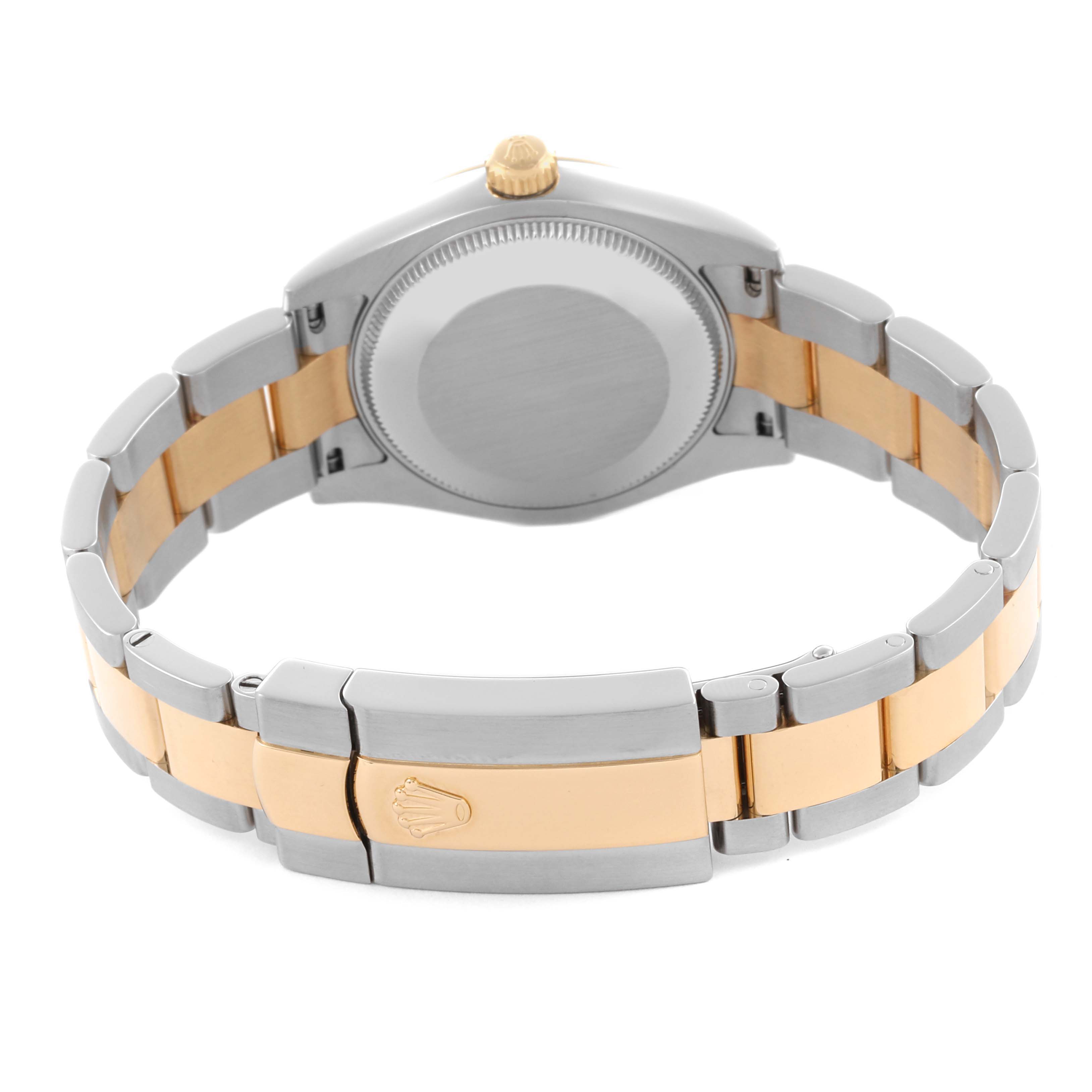 The image shows the back and bracelet of a Rolex Mid-Size 178243 Women's Steel and Gold (two tone) Black Dial 178243 Women's Steel and Gold (two tone) Black Dial watch, highlighting its two-tone design and clasp.