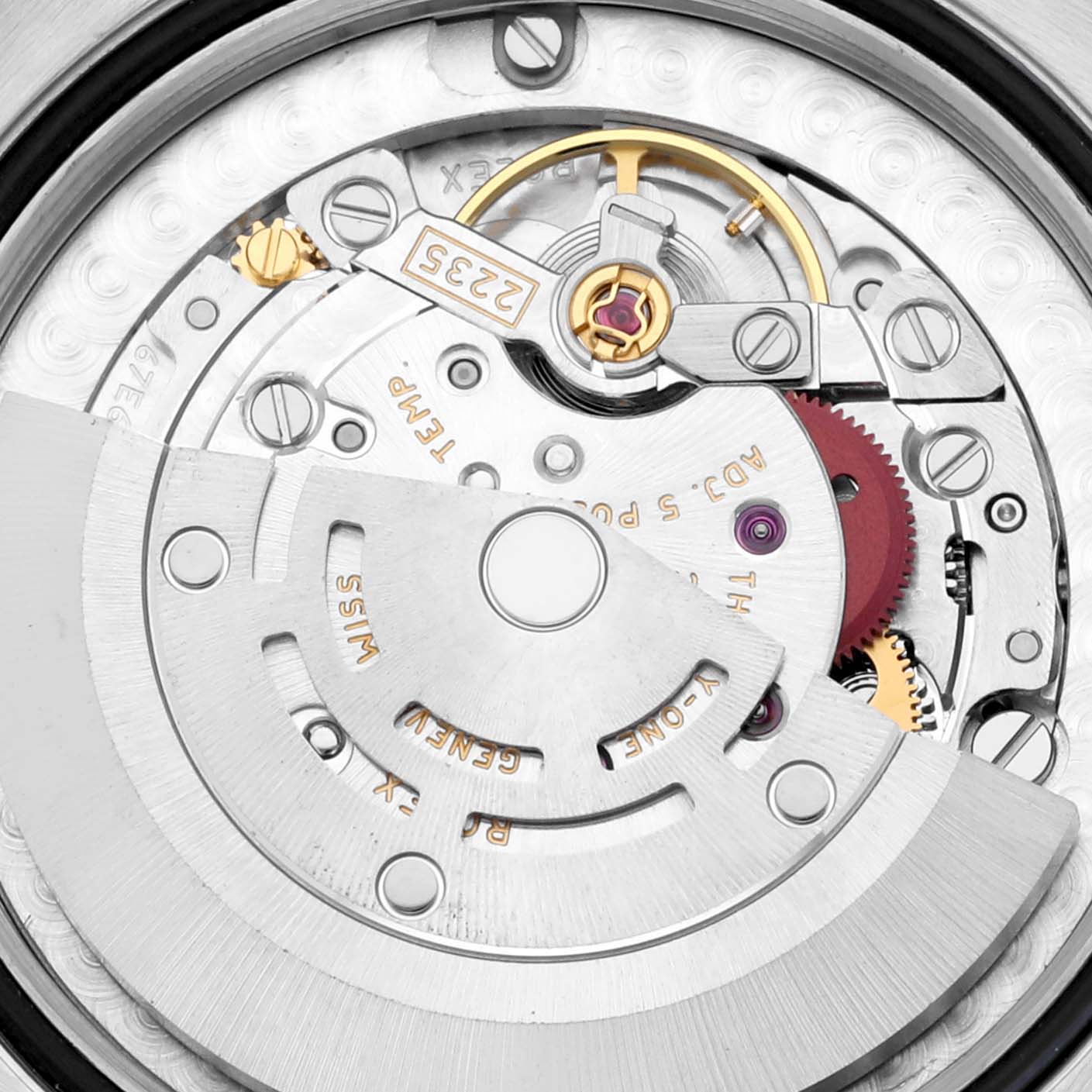 This image shows a close-up view of the movement inside the Rolex Mid-Size 178243 Women's Steel and Gold (two tone) Black Dial 178243 Women's Steel and Gold (two tone) Black Dial watch, highlighting the intricate mechanical components.