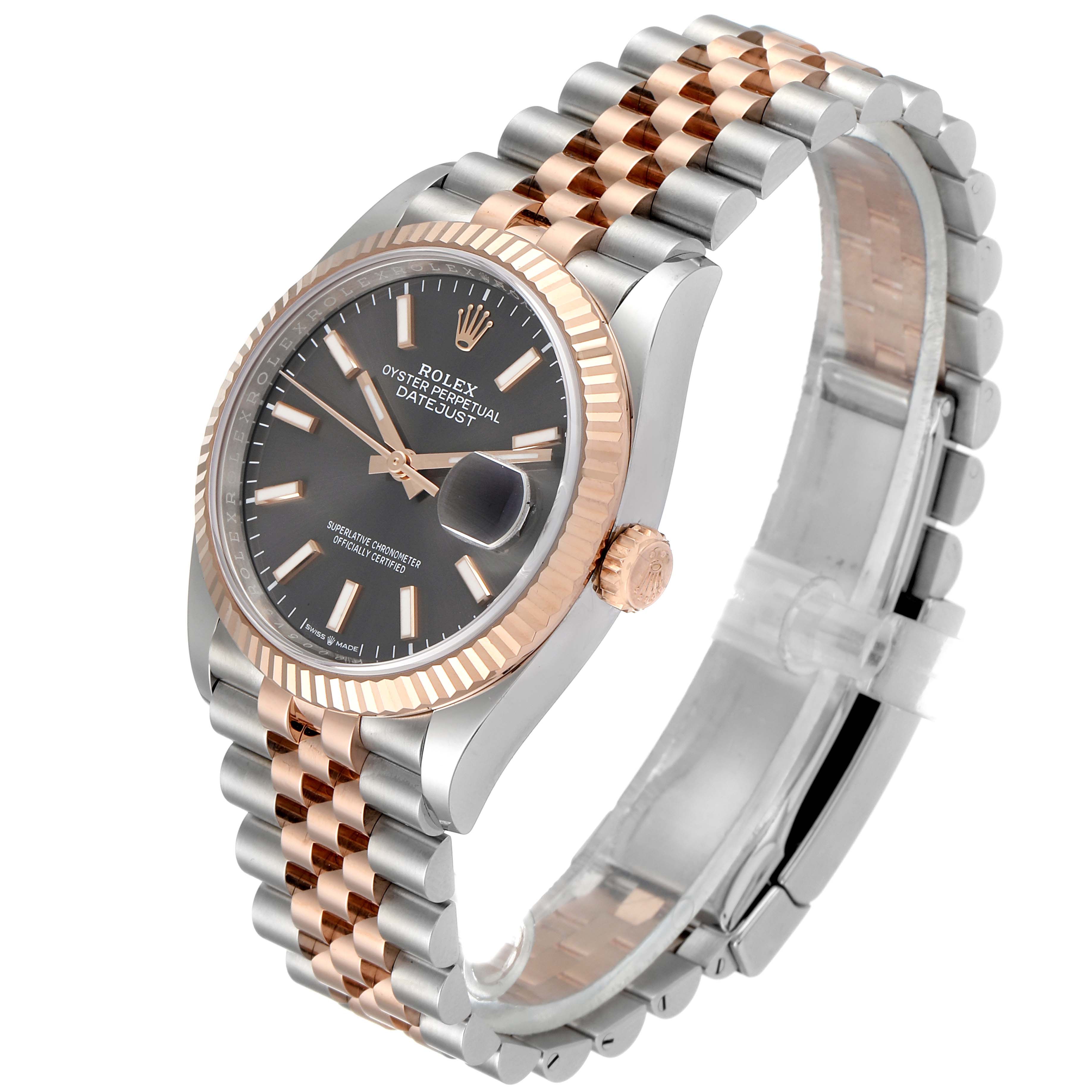 This image showcases a Rolex Datejust 126231 Men
s Steel and Gold (two tone) Grey Dial 126231 Men
s Steel and Gold (two tone) Grey Dial watch from an oblique angle, highlighting its face, bezel, crown, and jubilee bracelet.