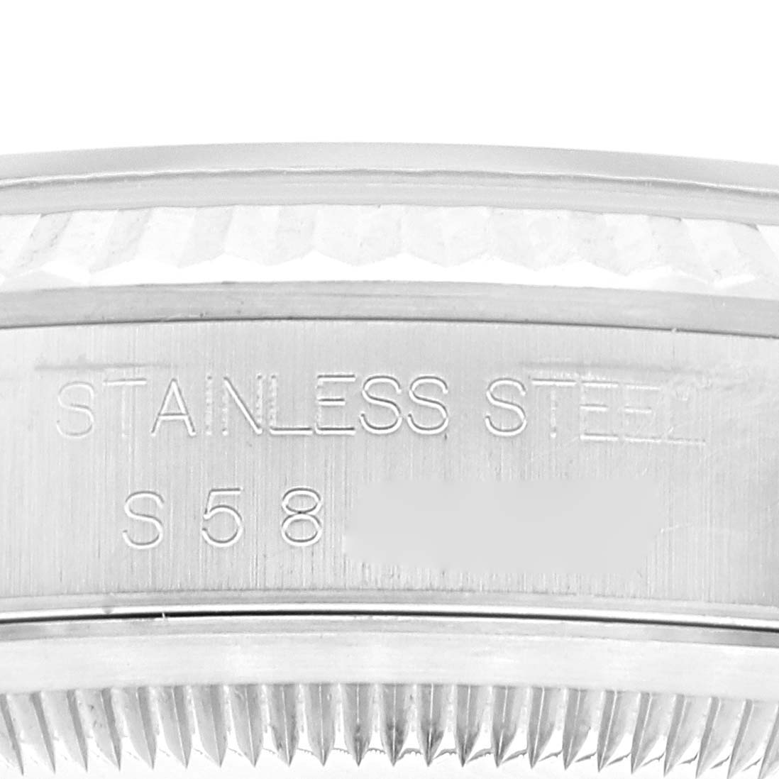 The image shows a close-up view of the stainless steel case and fluted bezel of a Rolex Datejust 16234 Men's Stainless Steel Blue Dial 16234 Men's Stainless Steel Blue Dial watch.