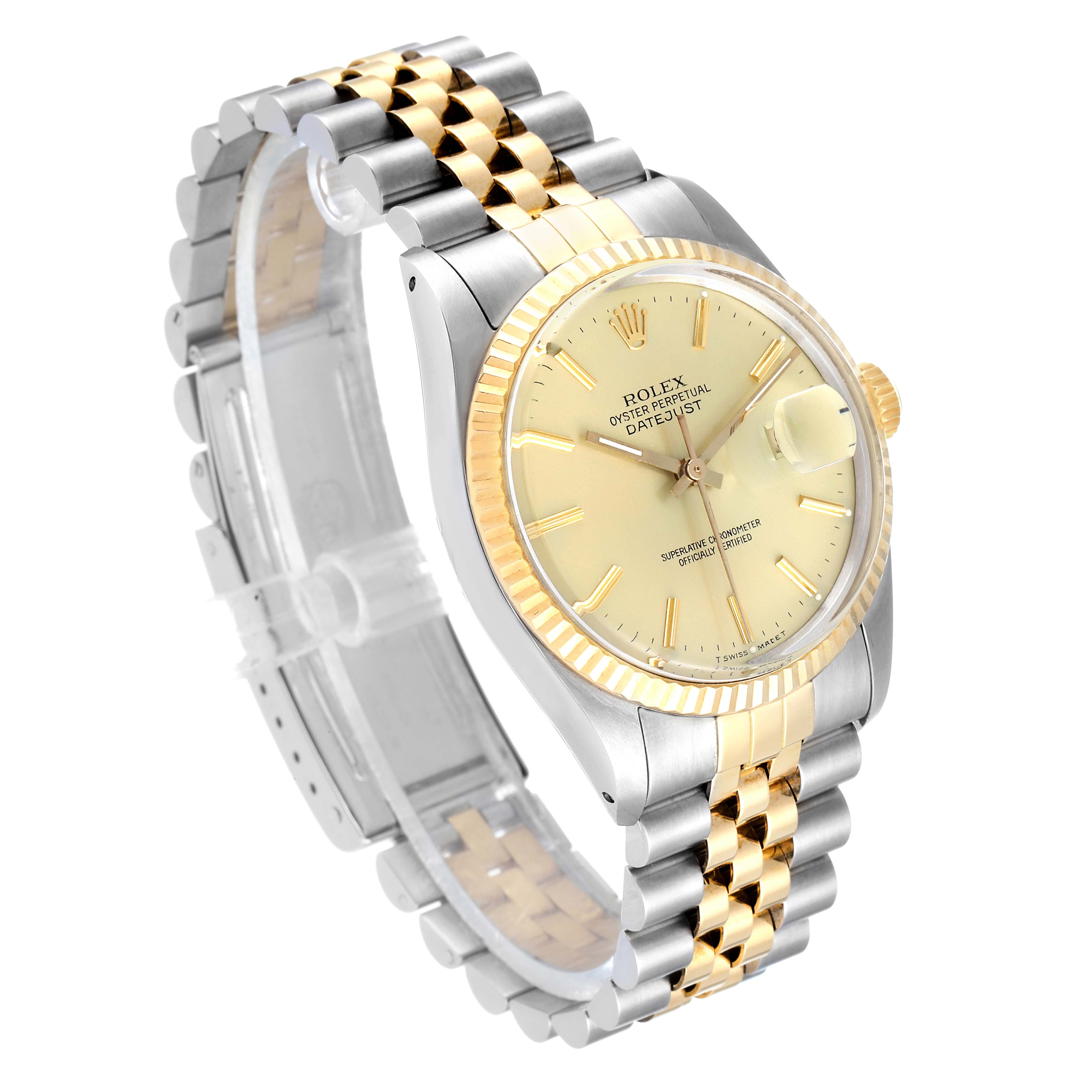 The Rolex Datejust 16013 Men's Steel and Gold (two tone) Champagne Dial 16013 Men's Steel and Gold (two tone) Champagne Dial watch is shown at an angle revealing the dial, case, bezel, and two-tone Jubilee bracelet.