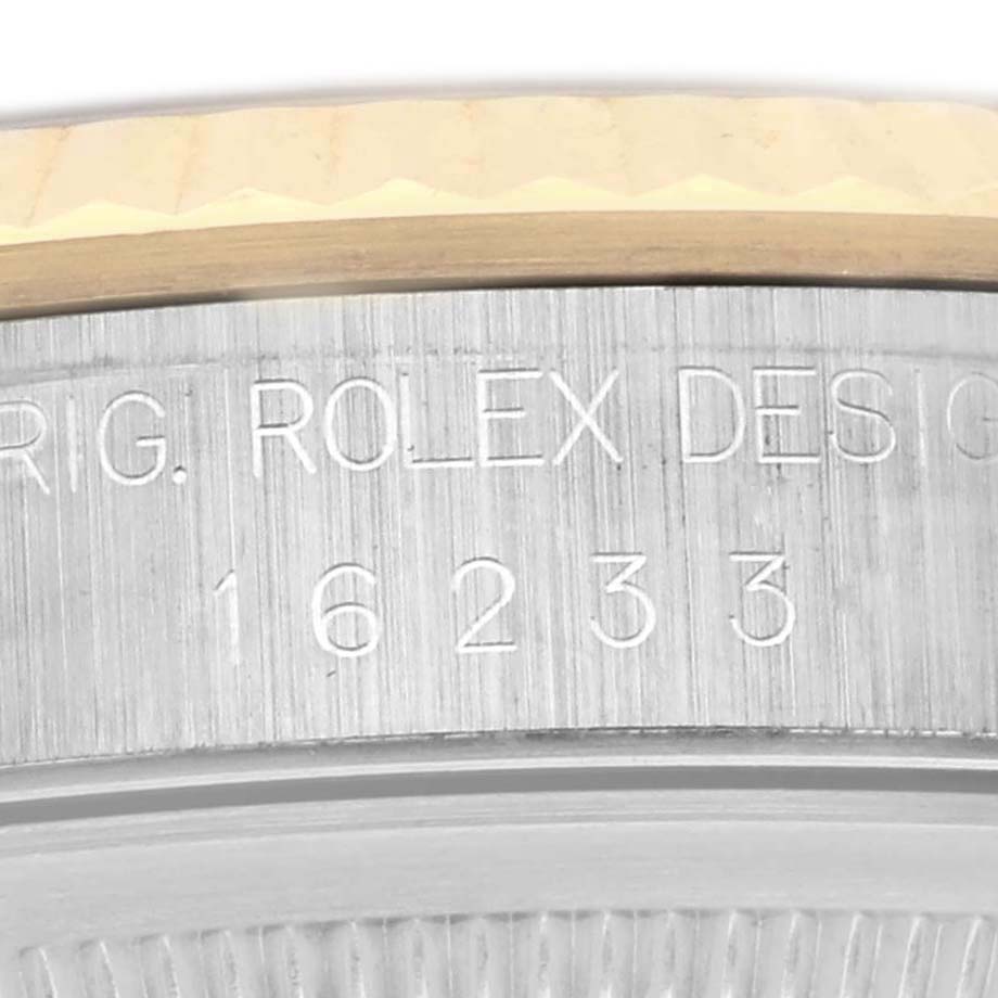 The image shows a close-up of the Rolex Datejust 16233 Men's Steel and Gold (two tone) Champagne Dial 16233 Men's Steel and Gold (two tone) Champagne Dial's engraved bezel and side view, featuring its model number.