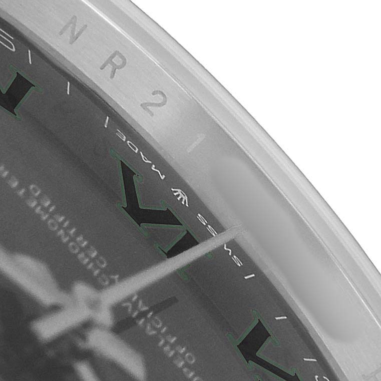 The image shows a close-up of the bezel and dial details of a Rolex Datejust 41 126334 Men's Stainless Steel Grey Dial, focusing on the "Swiss Made" text and Roman numeral.