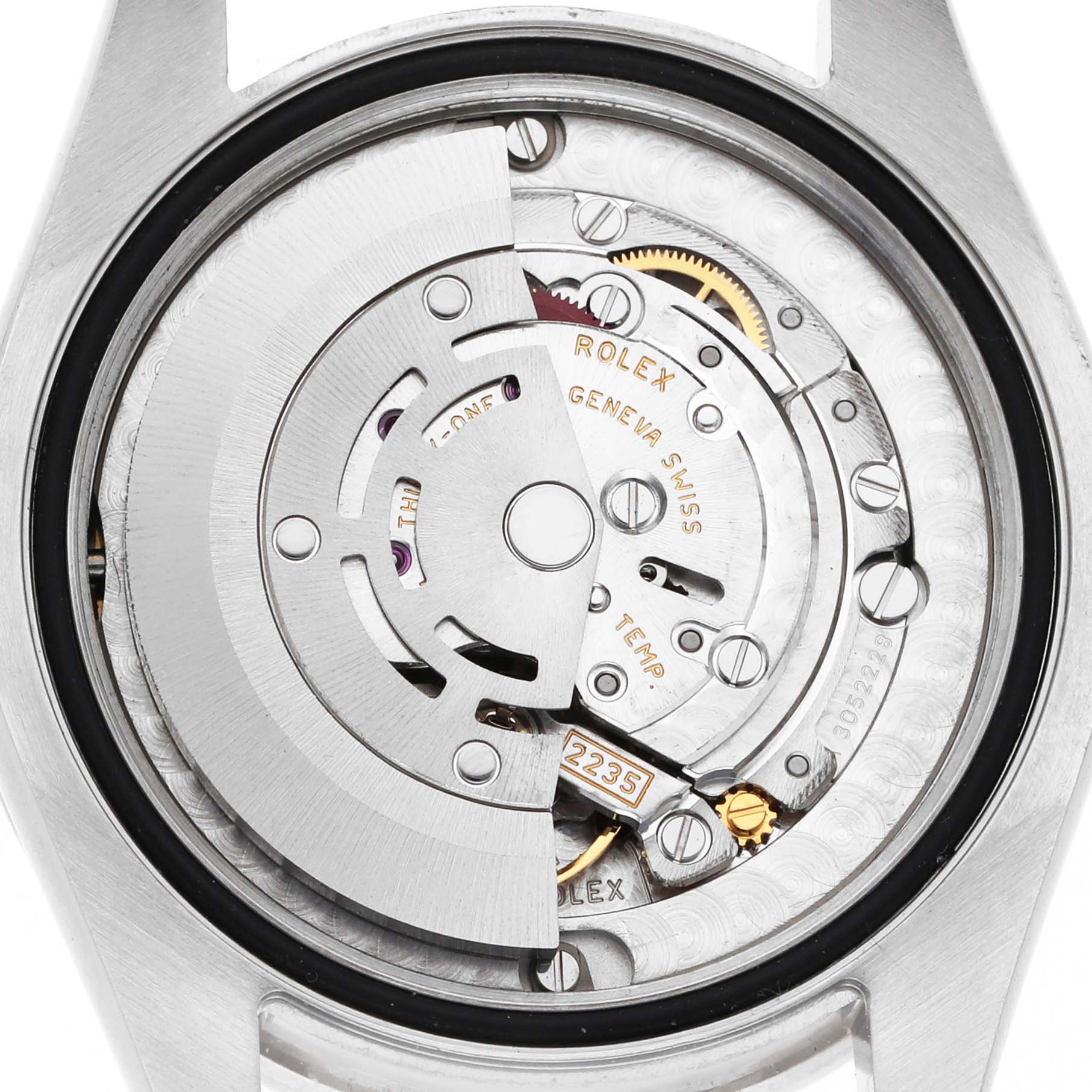 The image shows the movement of a Rolex Datejust 178384 Women's Stainless Steel Mother of Pearl Dial, focusing on the rotor and internal mechanisms from a rear angle.