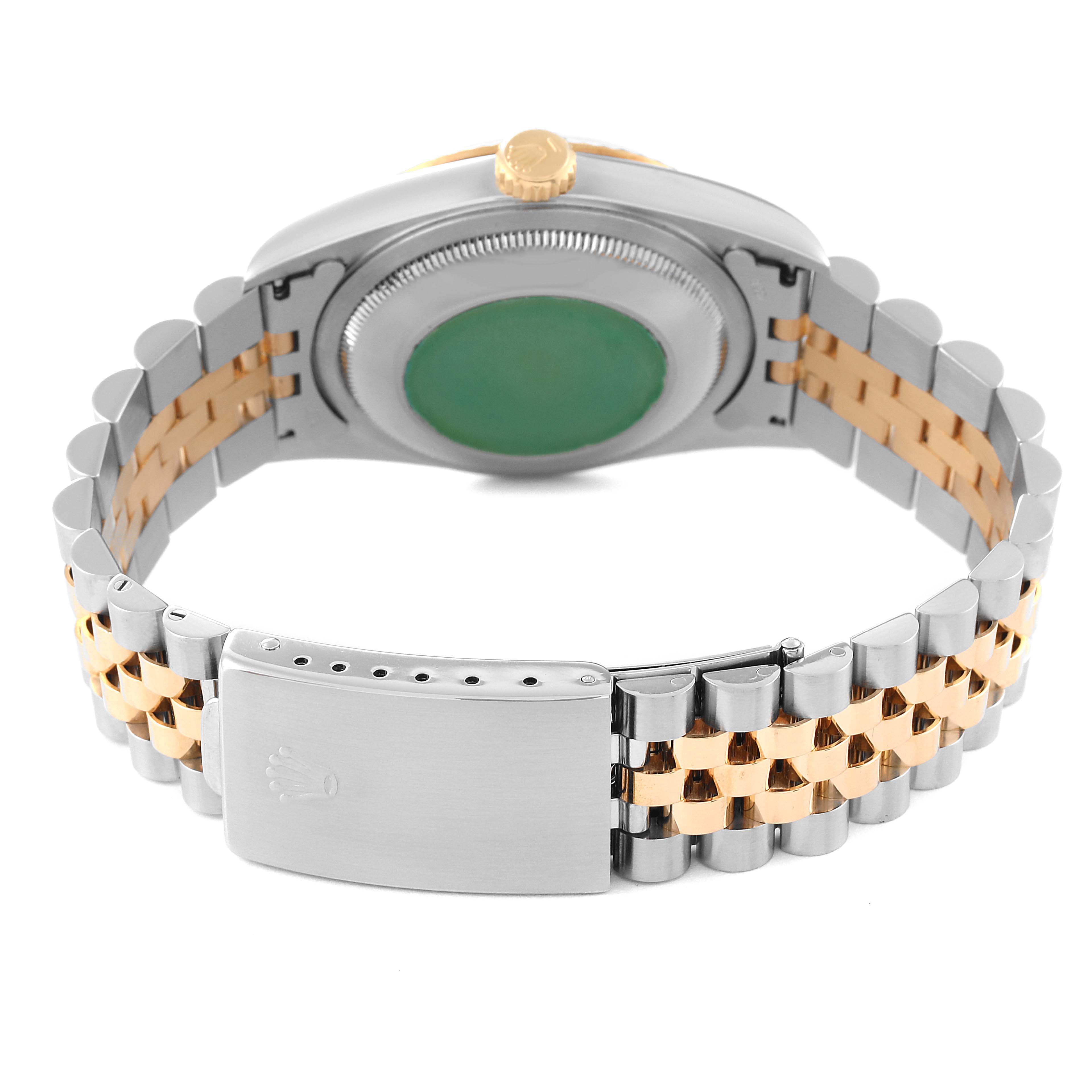 This image shows the back case and bracelet of a Rolex Datejust 16233 Men's Steel and Gold (two tone) Grey Dial 16233 Men's Steel and Gold (two tone) Grey Dial watch, highlighting its two-tone metal links and clasp.