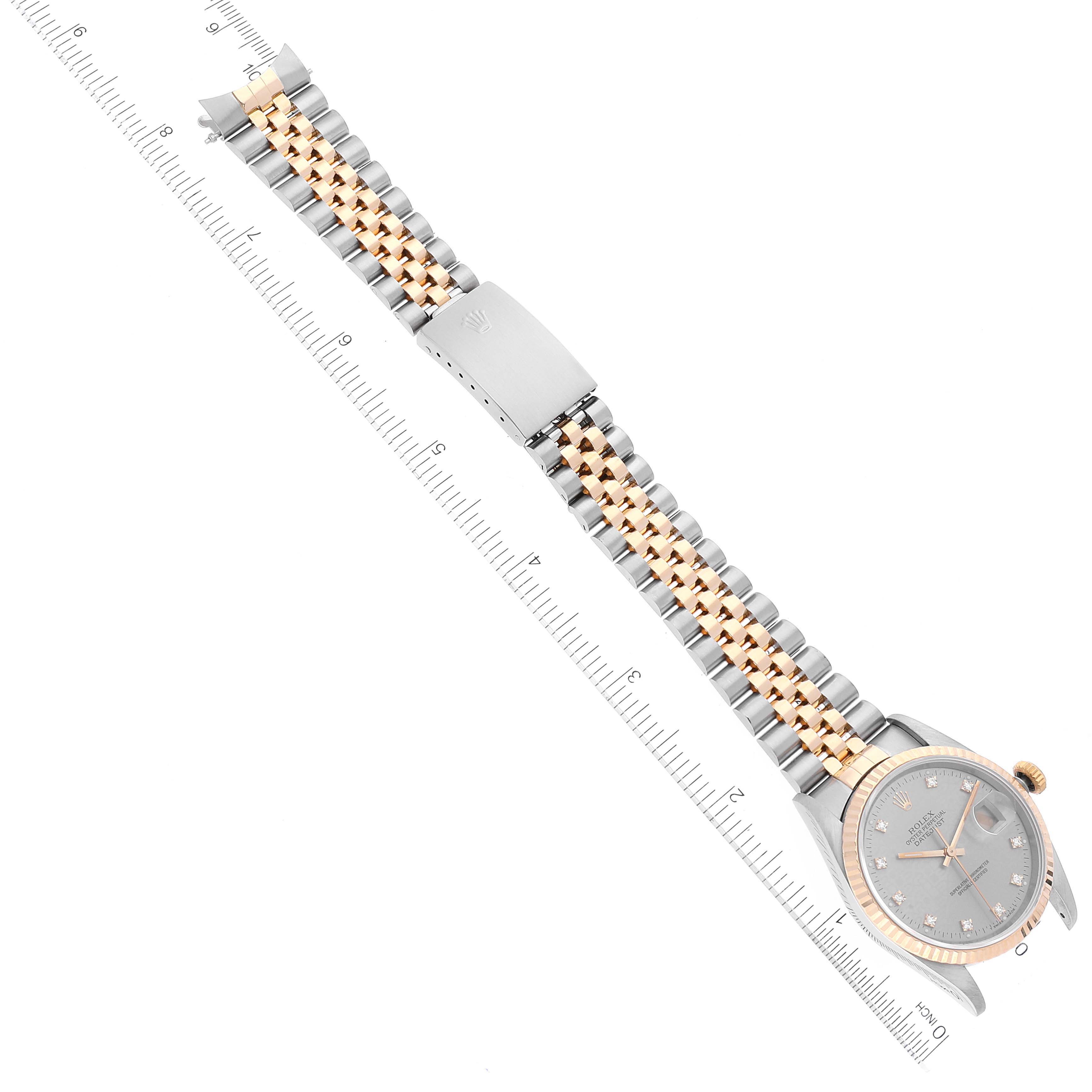 The image shows a Rolex Datejust 16233 Men's Steel and Gold (two tone) Grey Dial 16233 Men's Steel and Gold (two tone) Grey Dial watch from an overhead angle, including the full bracelet, clasp, case, bezel, and dial.