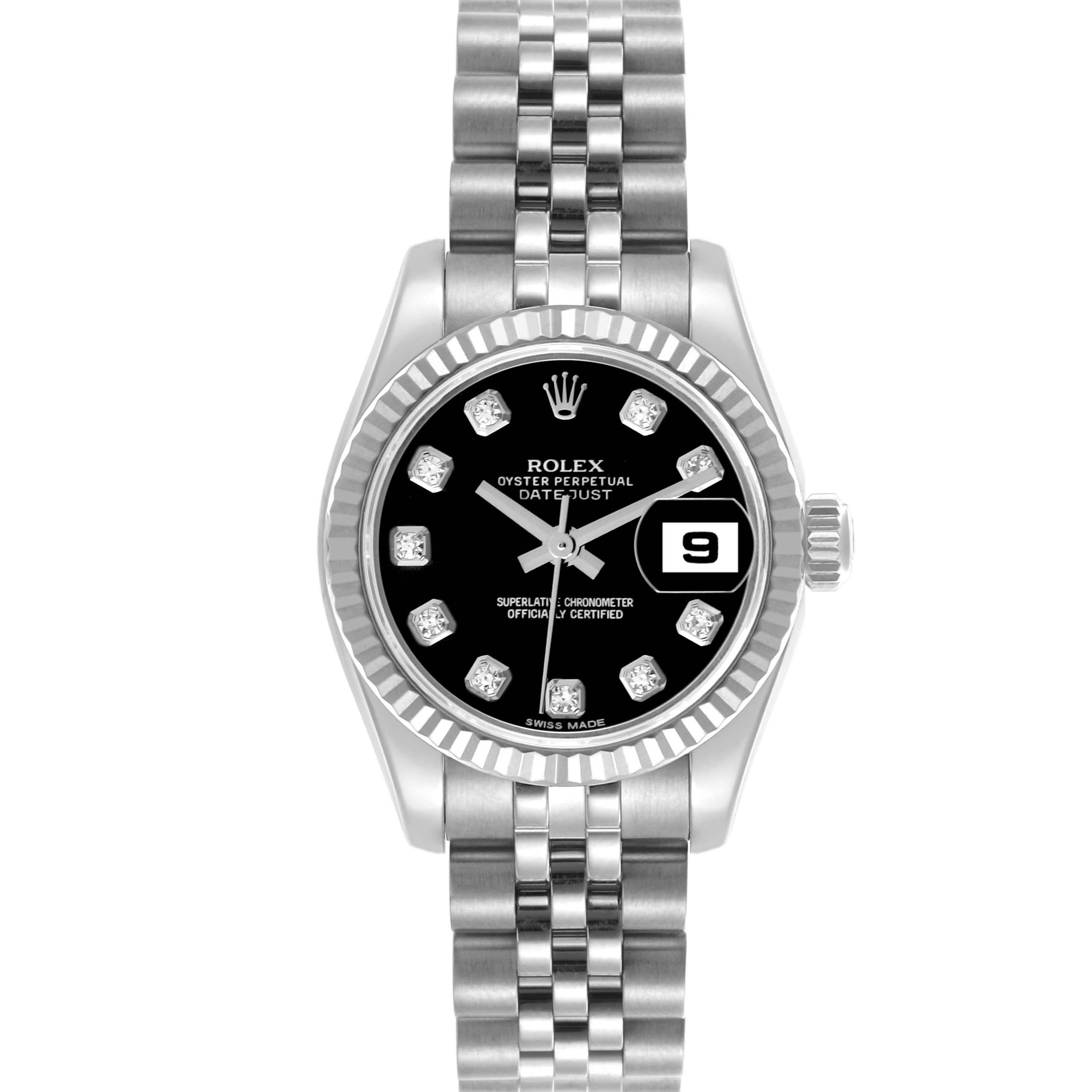 The Rolex Datejust 179174 Women's Stainless Steel Black Dial 179174 Women's Stainless Steel Black Dial watch is shown from a top-down angle, highlighting the dial, fluted bezel, and Jubilee bracelet.
