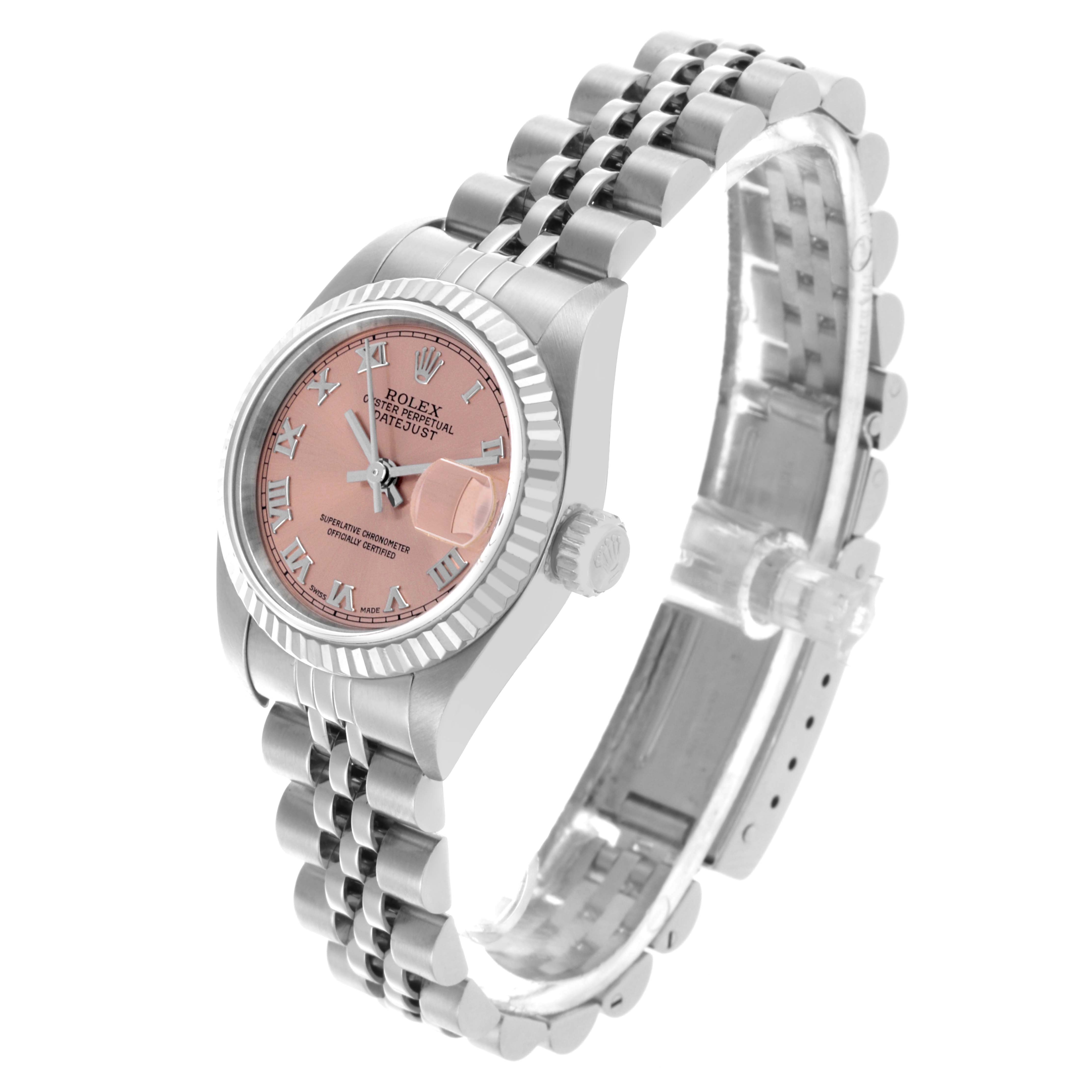The Rolex Datejust 79174 Women's Stainless Steel Pink Dial 79174 Women's Stainless Steel Pink Dial watch is shown at a three-quarter angle, highlighting the face, bezel, crown, and bracelet.