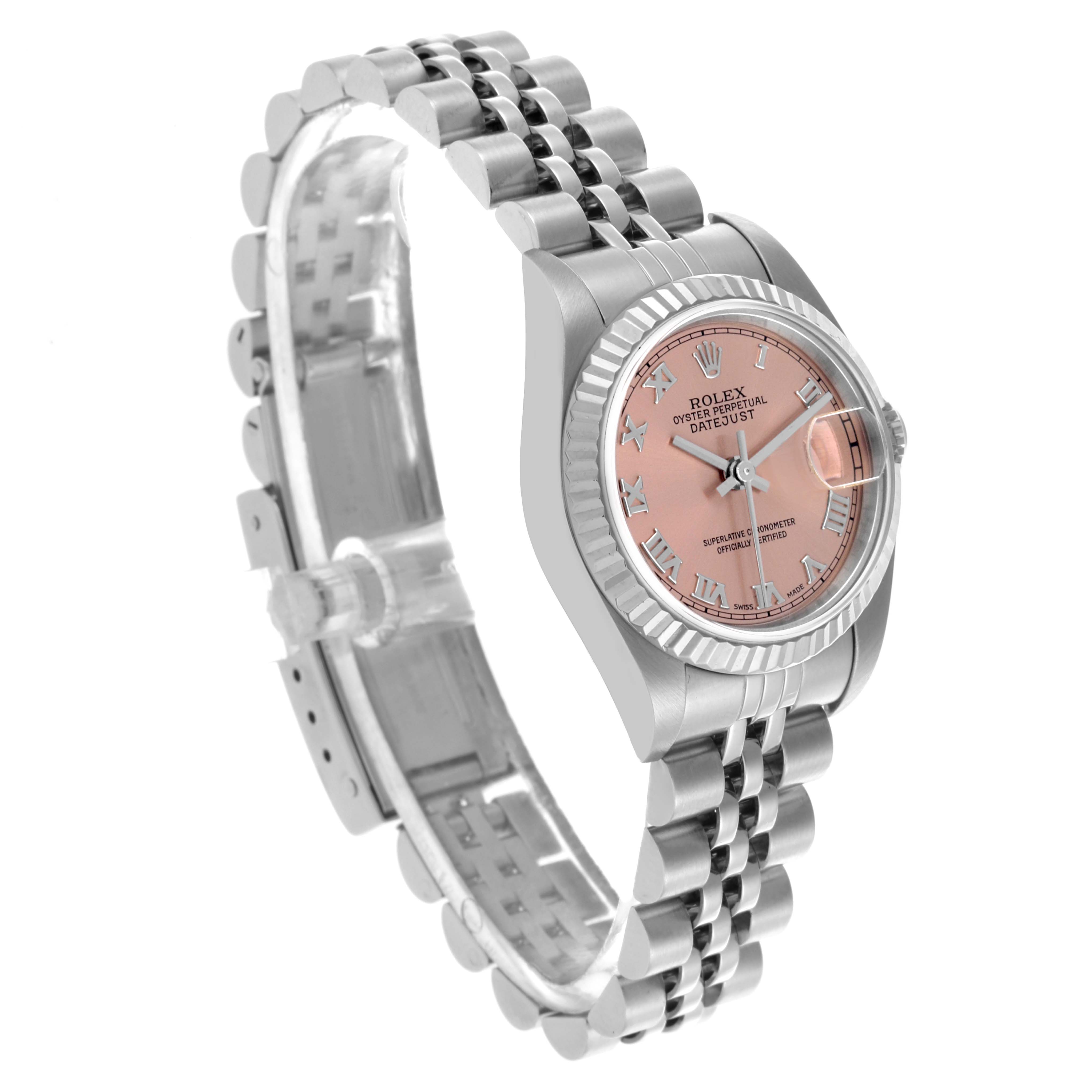 The Rolex Datejust 79174 Women's Stainless Steel Pink Dial 79174 Women's Stainless Steel Pink Dial watch is shown at an angled view, highlighting the bracelet, case, and face with a date window.