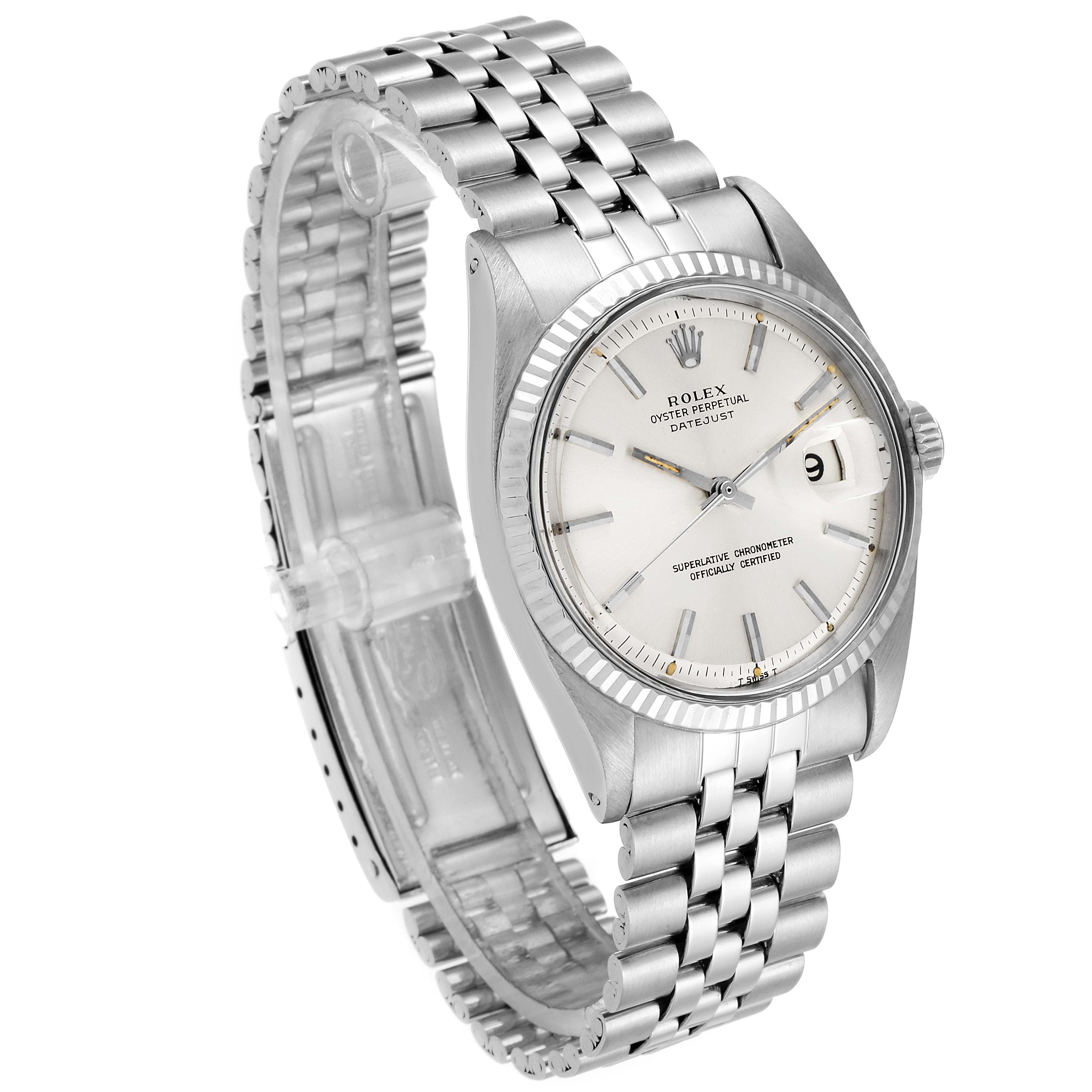 The image shows a side angle of the Rolex Vintage Collection 1601 Men
s Stainless Steel Silver Dial 1601 Men
s Stainless Steel Silver Dial watch featuring its silver bracelet, crown, and dial with date window.