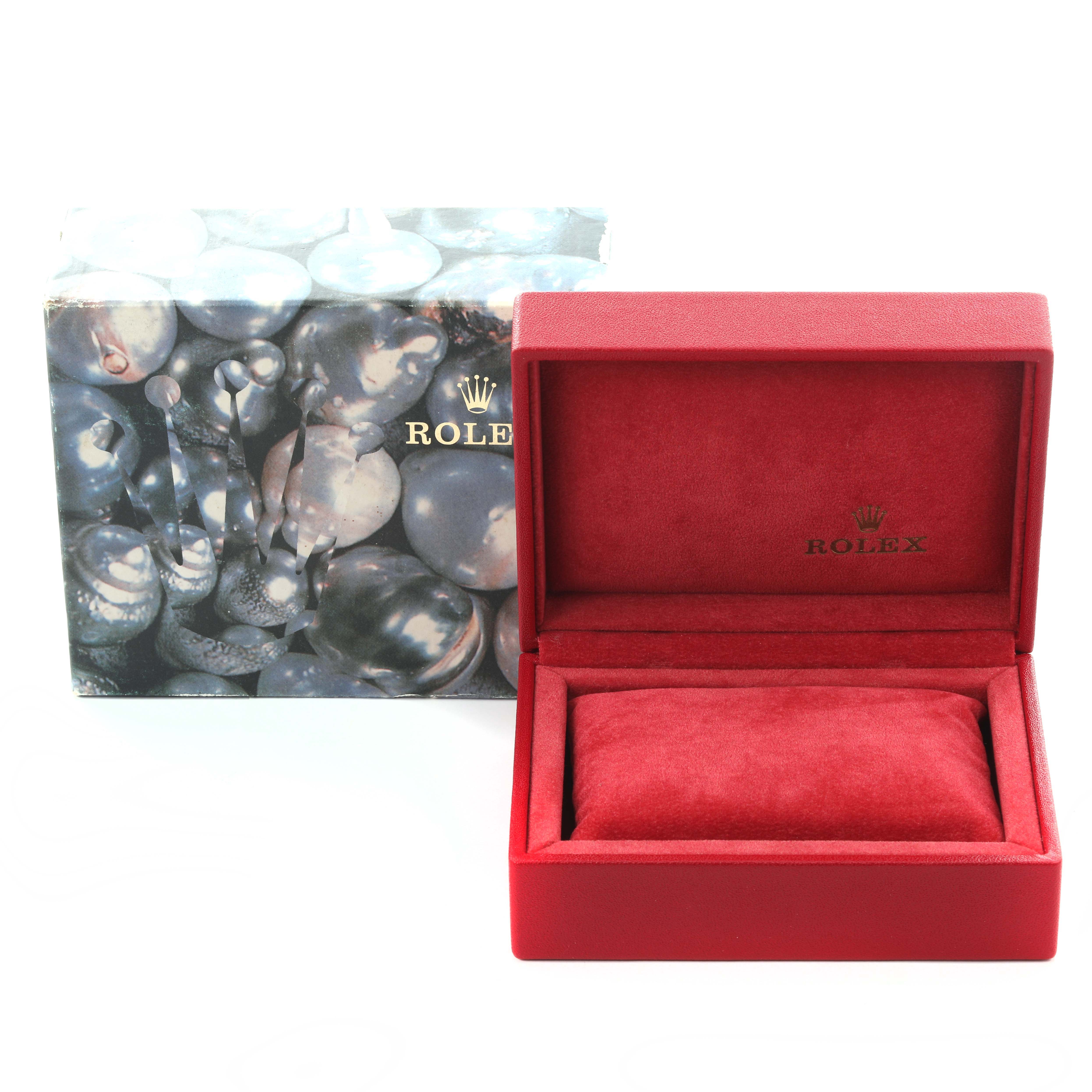 The image shows a Rolex Datejust 79174 Women's Stainless Steel Silver Dial 79174 Women's Stainless Steel Silver Dial watch box at a frontal angle with an open red case and decorative outer packaging.