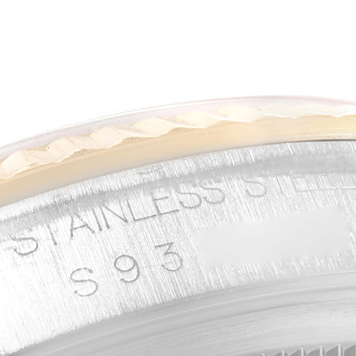 The image shows a close-up angle of the bezel and part of the stainless steel case of a Rolex Datejust 16233 Men
s Steel and Gold (two tone) Champagne Dial 16233 Men
s Steel and Gold (two tone) Champagne Dial watch.