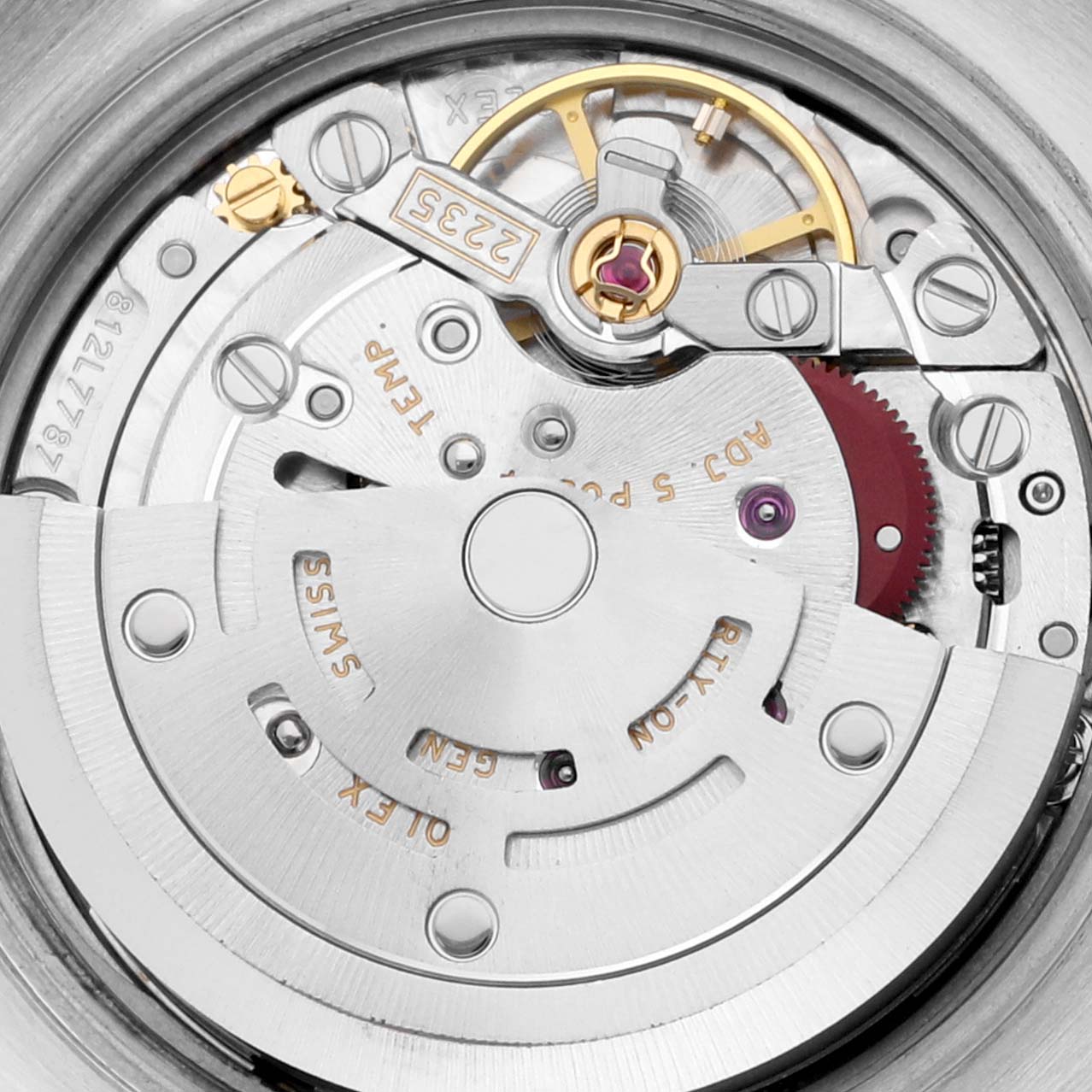 The image shows an overhead view of the Rolex Datejust 179383 Women's Steel and Gold (two tone) Mother of Pearl Dial 179383 Women's Steel and Gold (two tone) Mother of Pearl Dial's movement, highlighting the rotor and mechanical components.