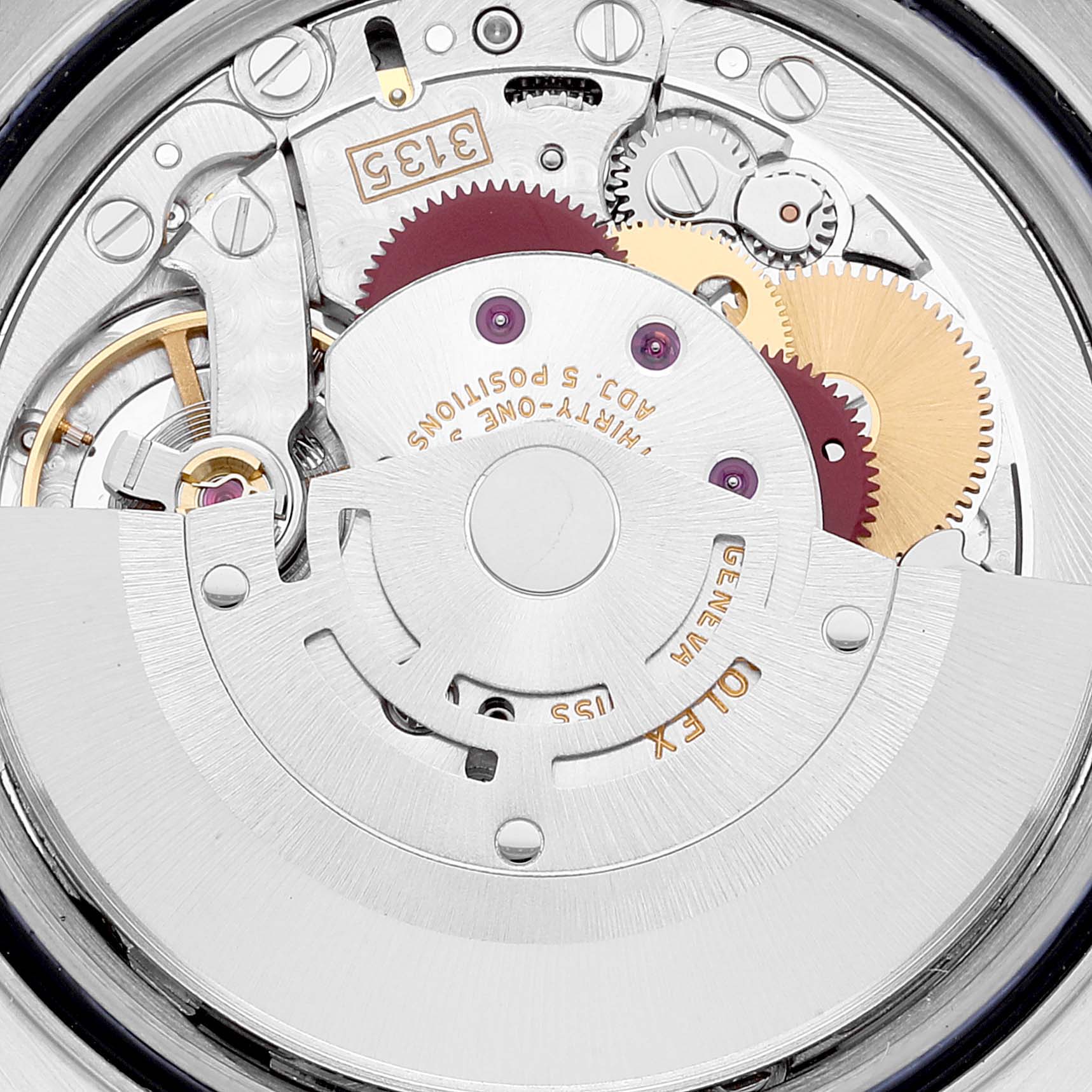 This image shows a close-up view of the internal movement of a Rolex Datejust 16233 Men's Steel and Gold (two tone) Grey Dial 16233 Men's Steel and Gold (two tone) Grey Dial watch, revealing gears and mechanical components.