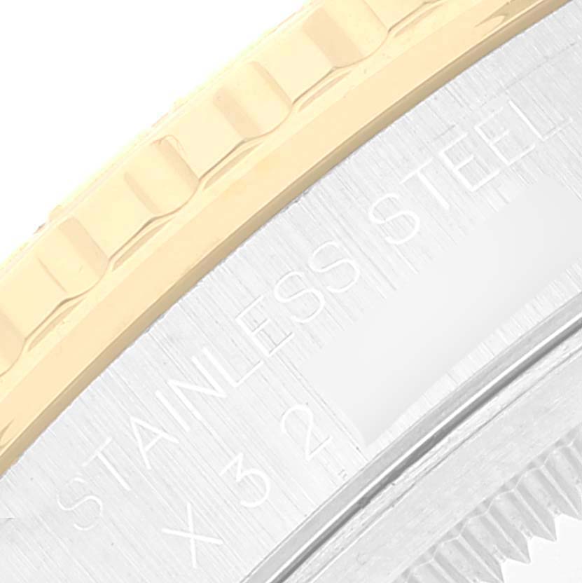 The image shows a close-up of the stainless steel casing and fluted bezel of a Rolex Turn-o-Graph 16263 Men's Steel and Gold (two tone) Beige Dial 16263 Men's Steel and Gold (two tone) Beige Dial watch.