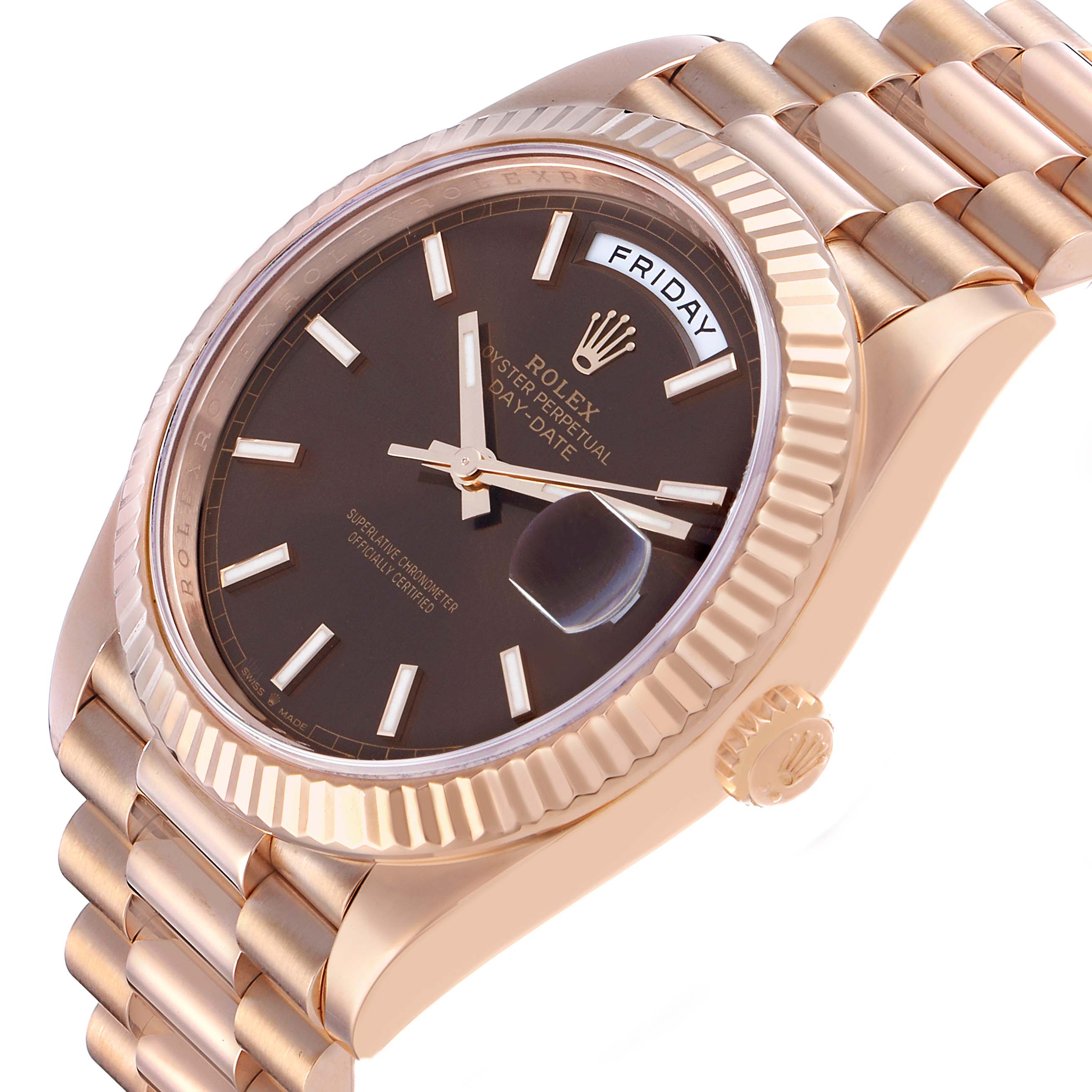 The Rolex President 228235 Men's Rose Gold Brown Dial watch is shown at an angle highlighting its bezel, dial, day indicator, crown, and part of the bracelet.