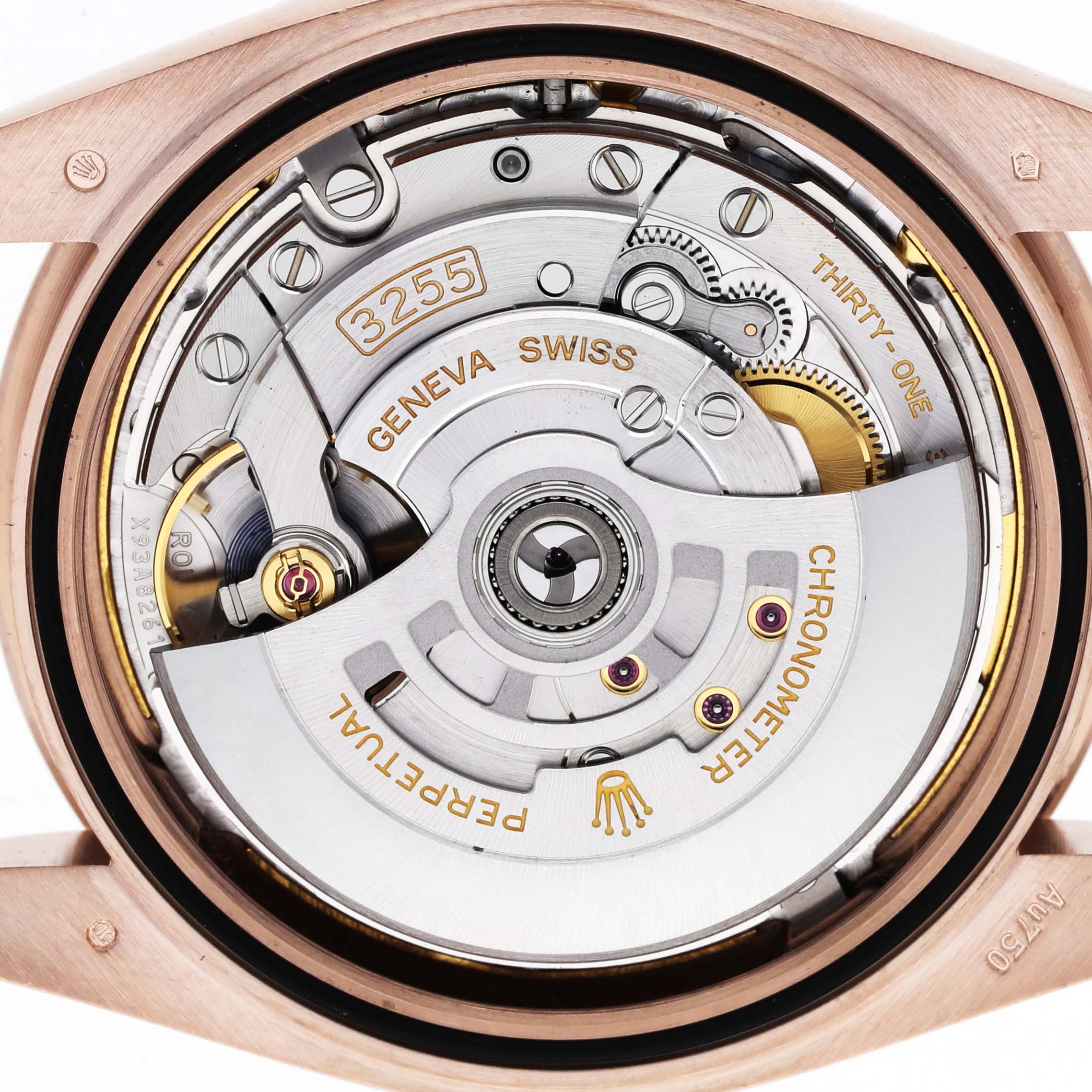The image shows the movement of a Rolex President 228235 Men's Rose Gold Brown Dial model, highlighting the caliber and rotor from a back view.