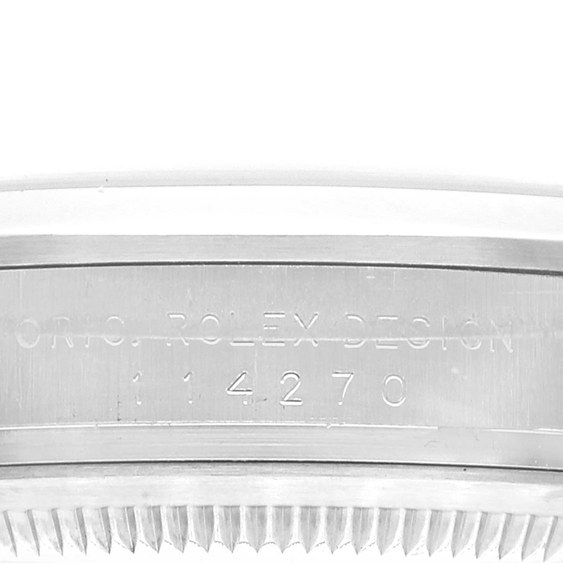 The image shows a close-up side view of the Rolex Explorer 114270 Men
s Stainless Steel Black Dial 114270 Men
s Stainless Steel Black Dial model 114270, highlighting the engraved case and design details.