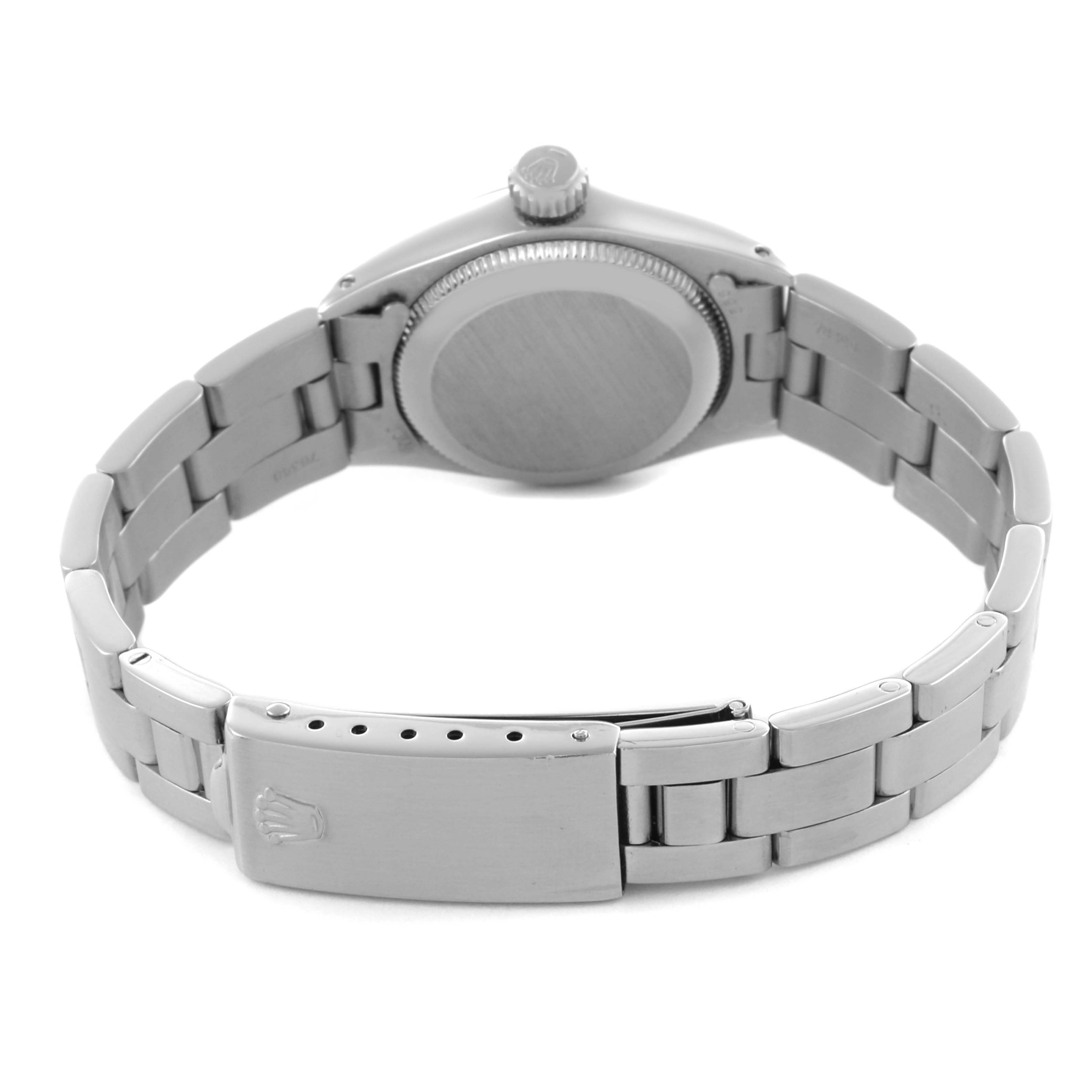 The image shows the back of a Rolex Oyster Perpetual 6723 Women's Stainless Steel Silver Dial 6723 Women's Stainless Steel Silver Dial watch, focusing on the bracelet and case back.