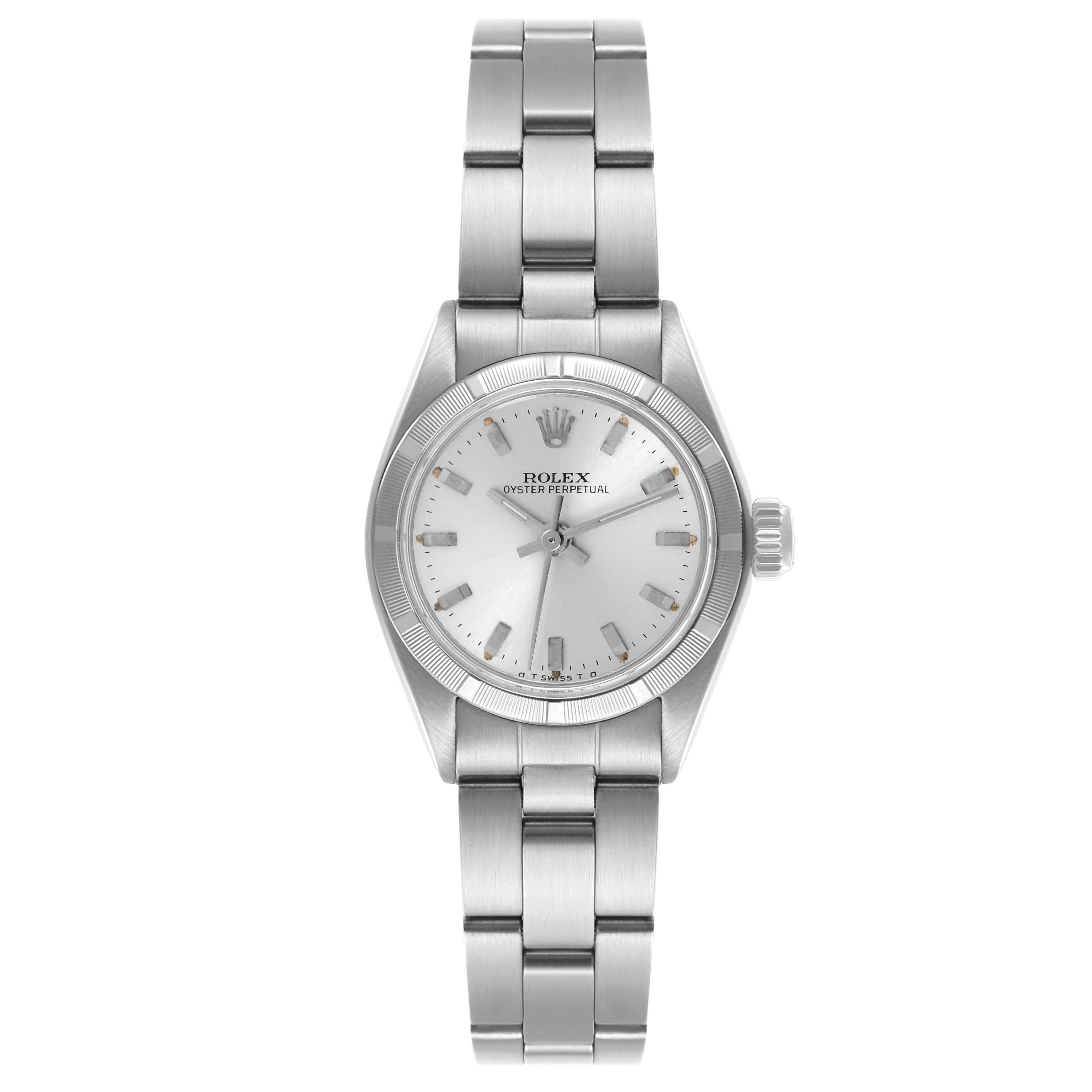 The Rolex Oyster Perpetual 6723 Women's Stainless Steel Silver Dial 6723 Women's Stainless Steel Silver Dial watch is shown from the front, displaying the face, bezel, crown, and bracelet.