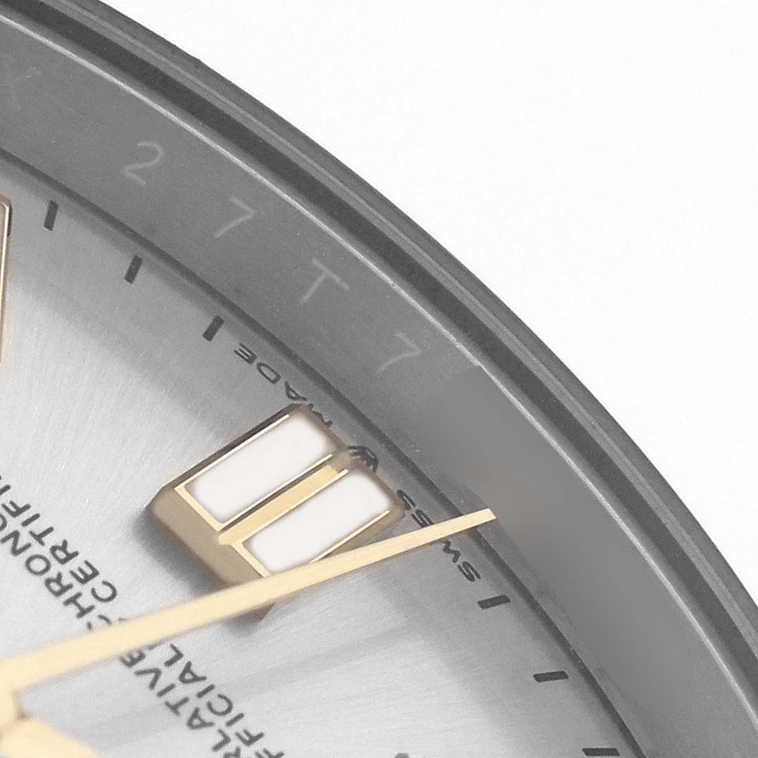 The image shows a close-up of the Rolex Oyster Perpetual 124300 Men's Stainless Steel Silver Dial watch face from an angled top view, highlighting the indices and hands.
