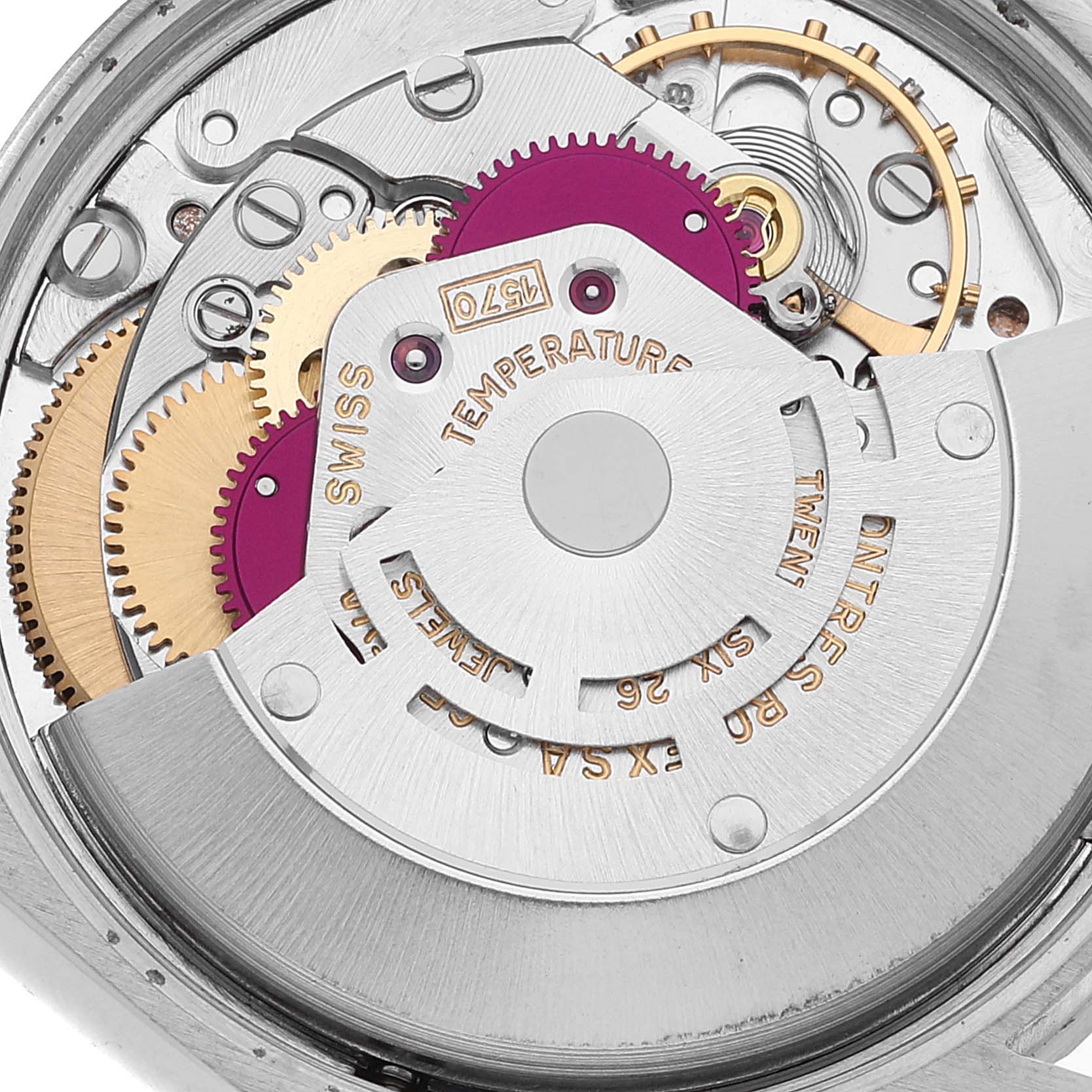 The image shows the intricate inner mechanism of a Rolex Oyster Perpetual 1007 Men
s Stainless Steel Silver Dial 1007 Men
s Stainless Steel Silver Dial watch at a close angle, highlighting gears and components.