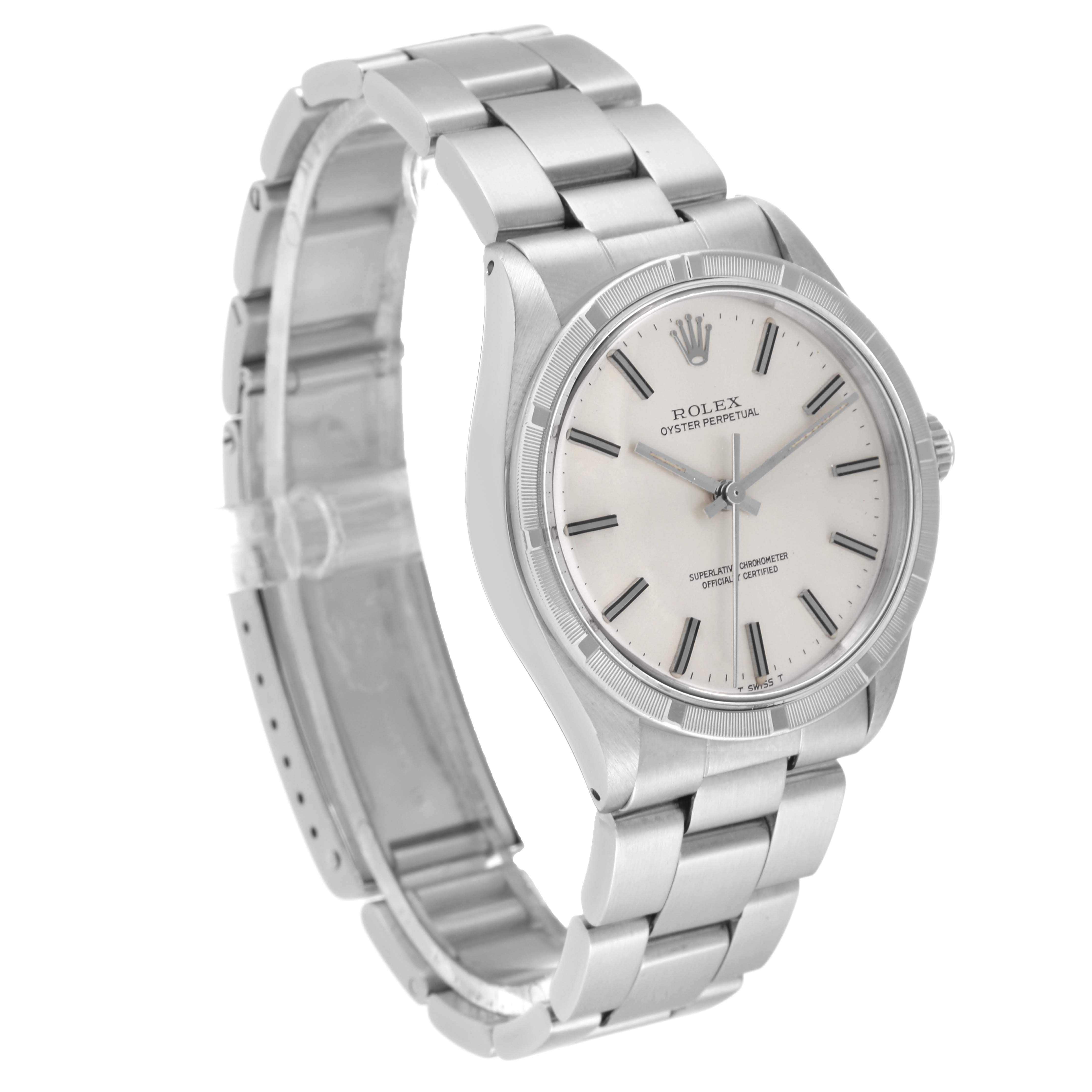 The image shows a Rolex Oyster Perpetual 1007 Men
s Stainless Steel Silver Dial 1007 Men
s Stainless Steel Silver Dial watch at a slight side angle, displaying its face, bezel, and bracelet.