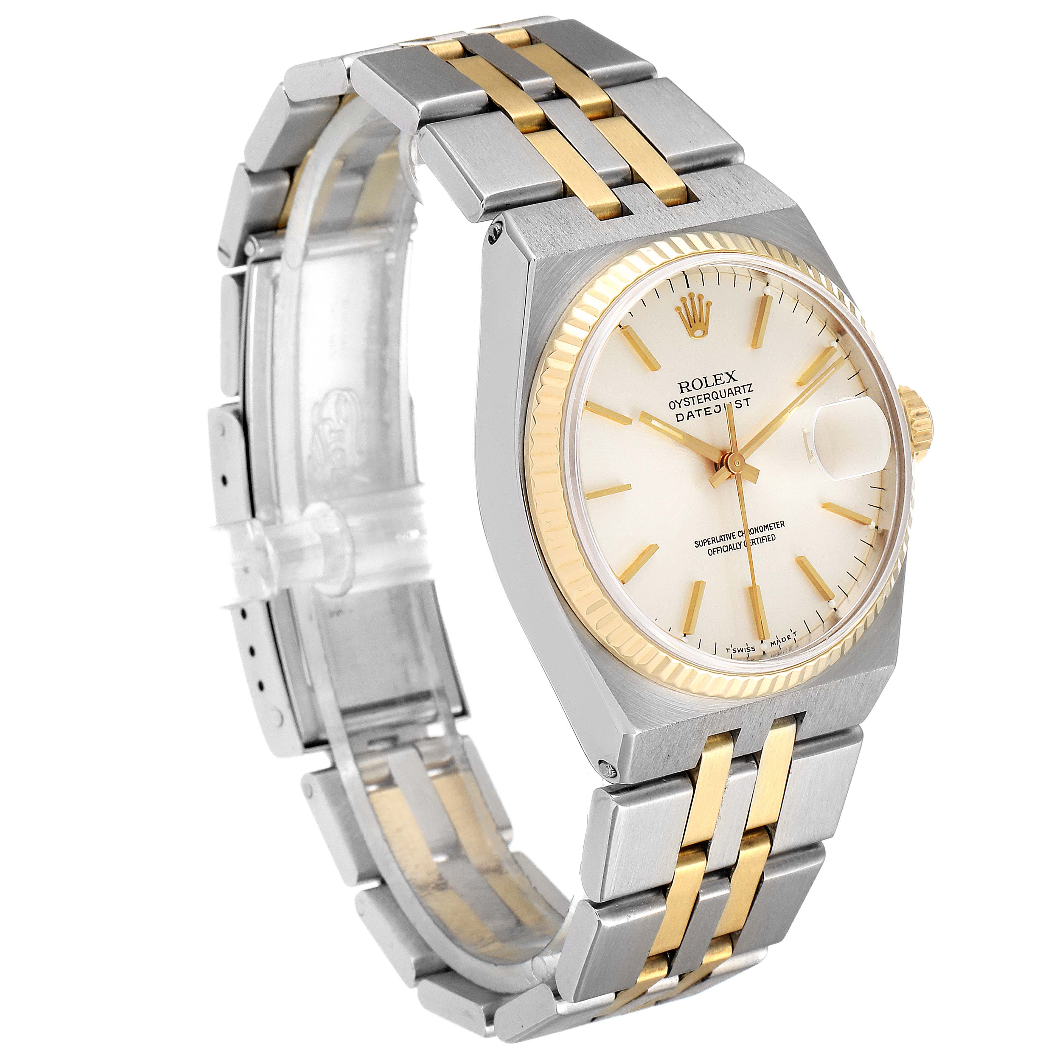 The Rolex Oysterquartz 17013 Men's Steel and Gold (two tone) Silver Dial 17013 Men's Steel and Gold (two tone) Silver Dial watch is shown at a three-quarter angle, highlighting the dial, bezel, and bracelet.