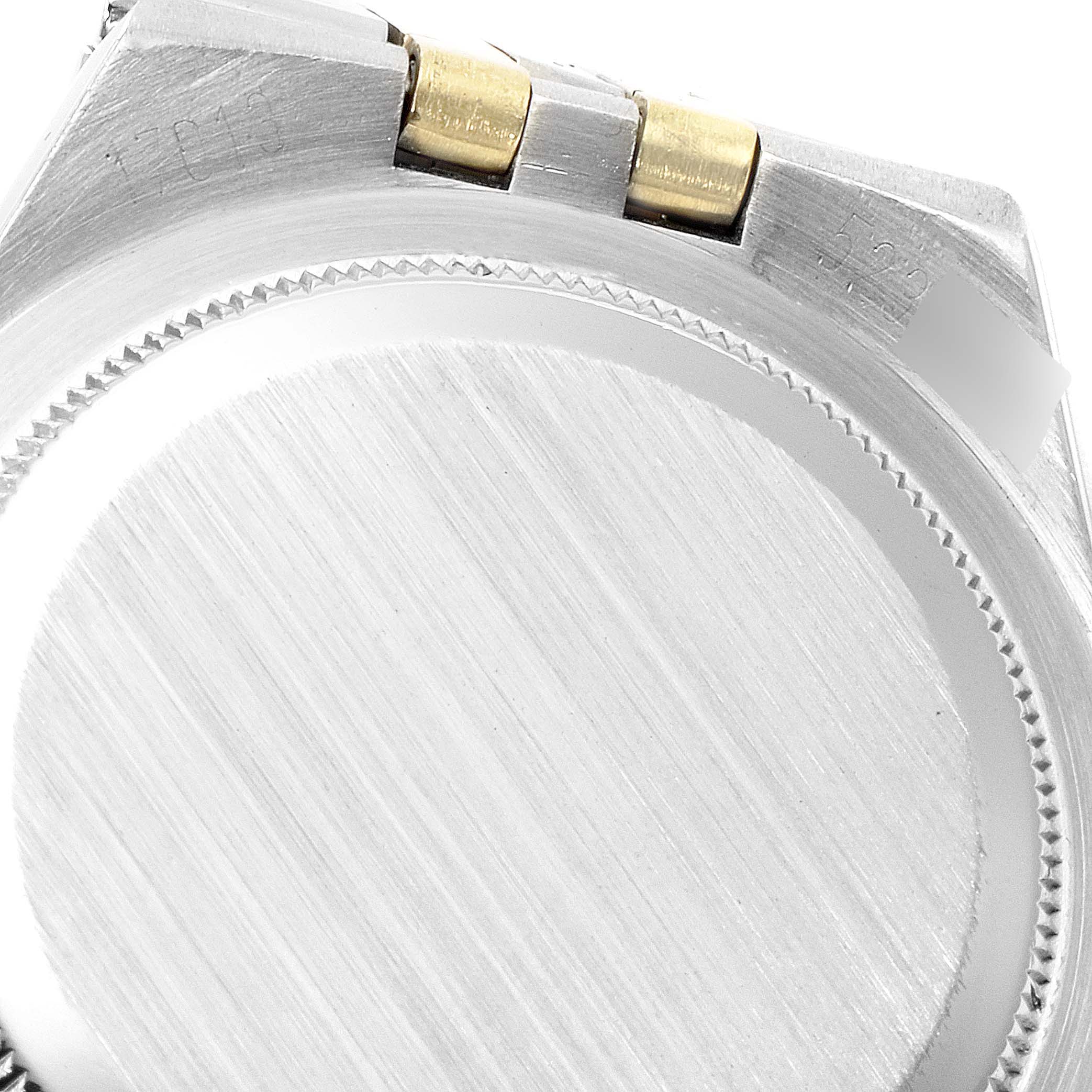 This image shows the back view of the Oysterquartz model by Rolex, highlighting part of the case and the bracelet attachment.